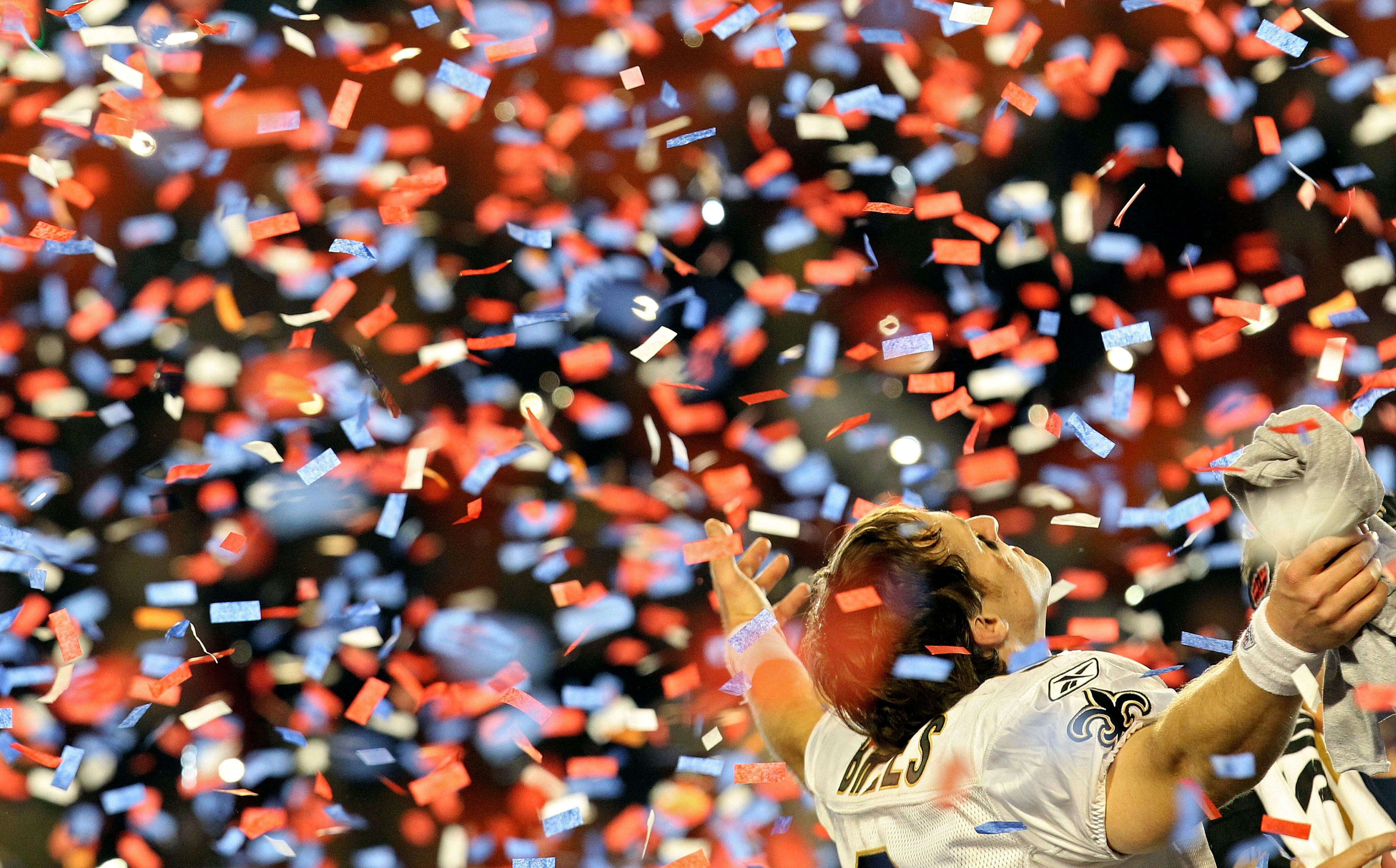 MIAMI GARDENS, FL - FEBRUARY 07:  Drew Brees #9 of the New Orleans Saints celebrates after defeating the Indianapolis Colts during Super Bowl XLIV on February 7, 2010 at Sun Life Stadium in Miami Gardens, Florida.  (Photo by Ronald Martinez/Getty Images)