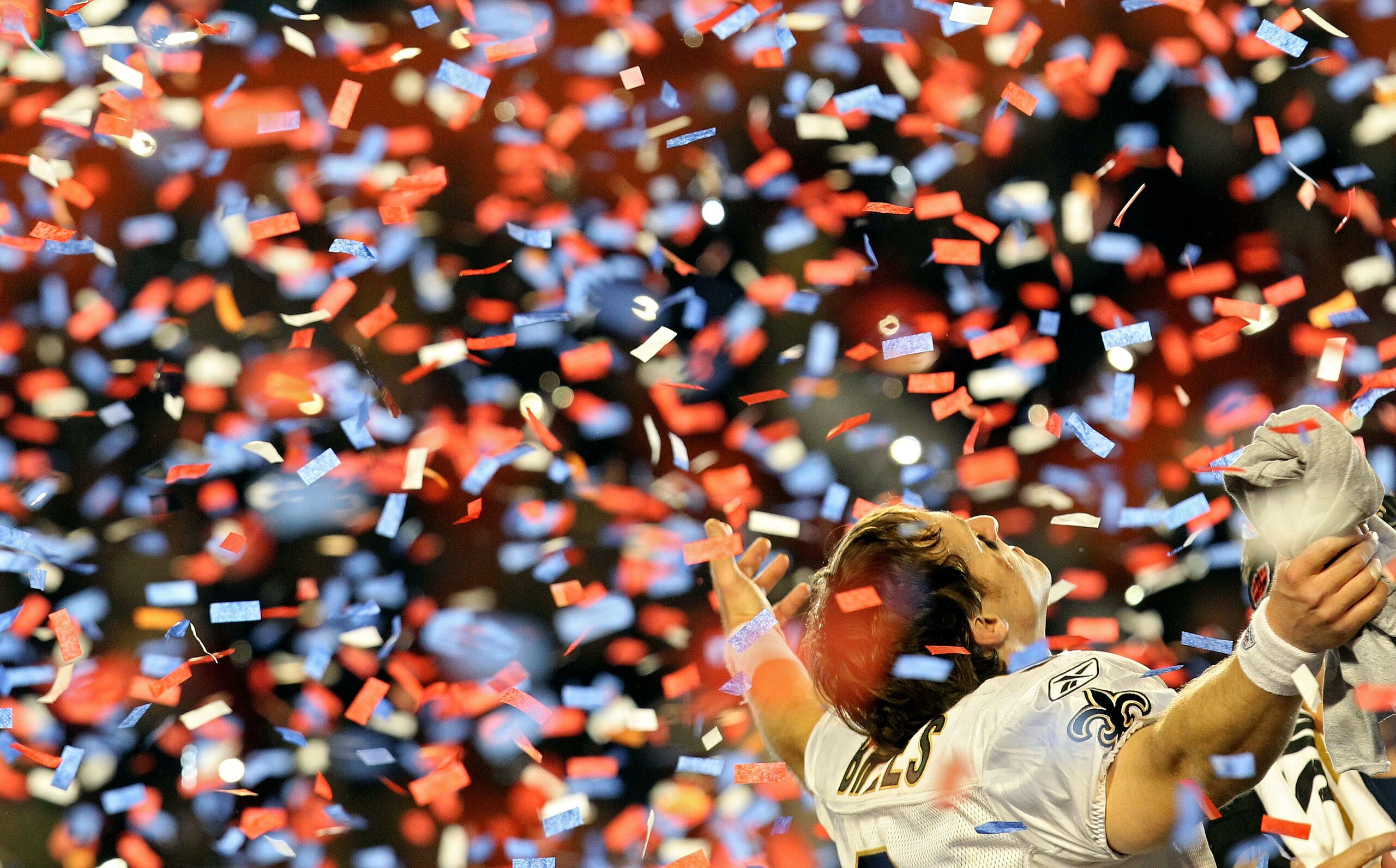 MIAMI GARDENS, FL - FEBRUARY 07:  Drew Brees #9 of the New Orleans Saints celebrates after defeating the Indianapolis Colts during Super Bowl XLIV on February 7, 2010 at Sun Life Stadium in Miami Gardens, Florida.  (Photo by Ronald Martinez/Getty Images)