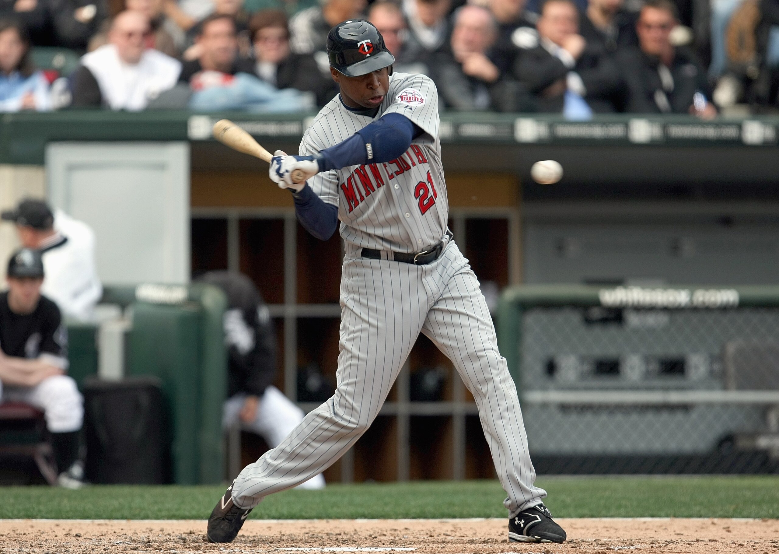 CHICAGO - APRIL 07: Delmon Young #21 of the Minnesota Twins swings at a pitch against the Chicago White Sox during the Opening Day game on April 7, 2008 at U.S. Cellular Field in Chicago, Illinois. (Photo by Jonathan Daniel/Getty Images)