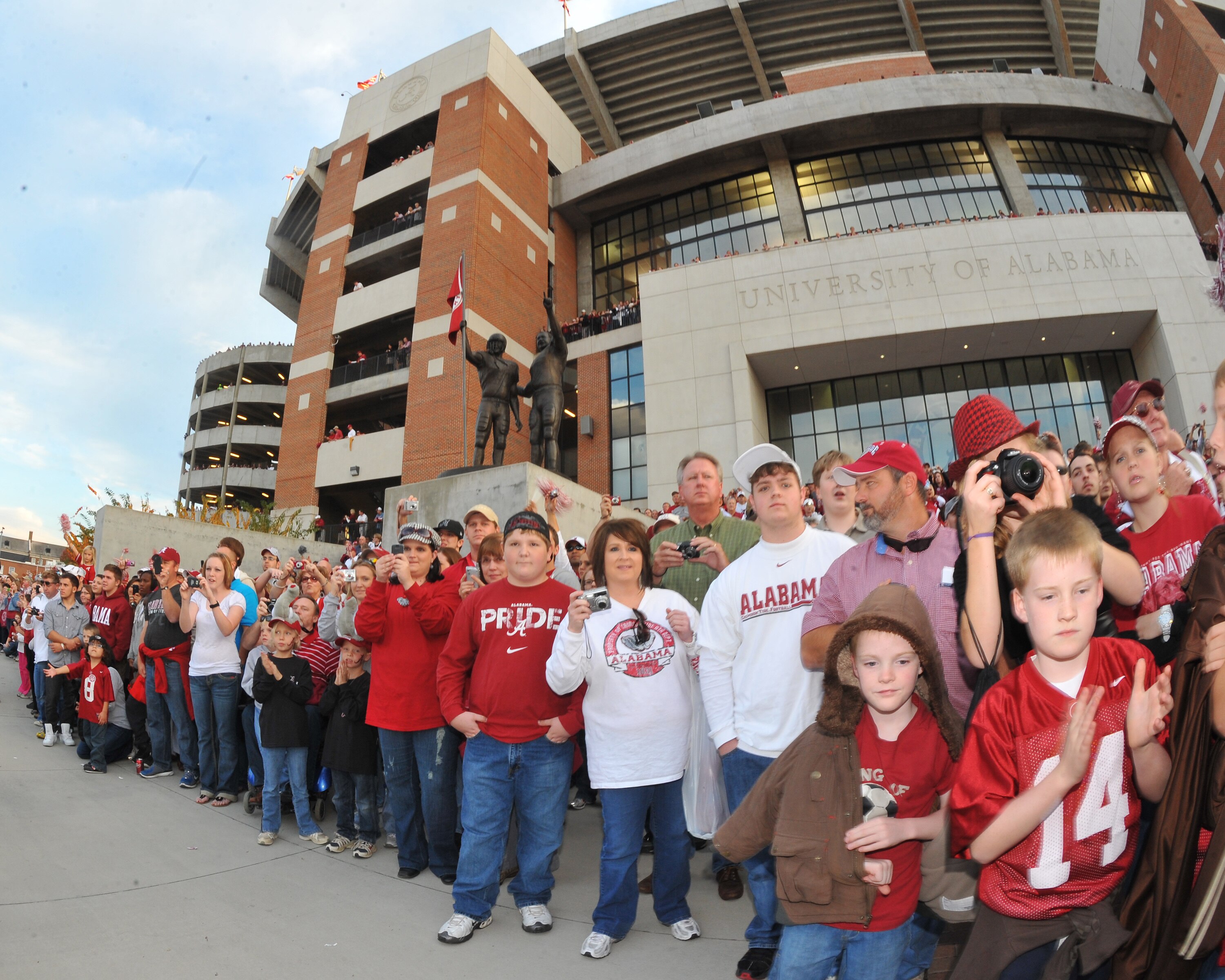 TUSCALOOSA, AL - NOVEMBER 13: Fans of the Alabama Crimson Tide line the sidewalk as the team enters the stadium for play against the Mississippi State Bulldogs November 13, 2010 at Bryant-Denny Stadium in Tuscaloosa, Alabama.  (Photo by Al Messerschmidt/G