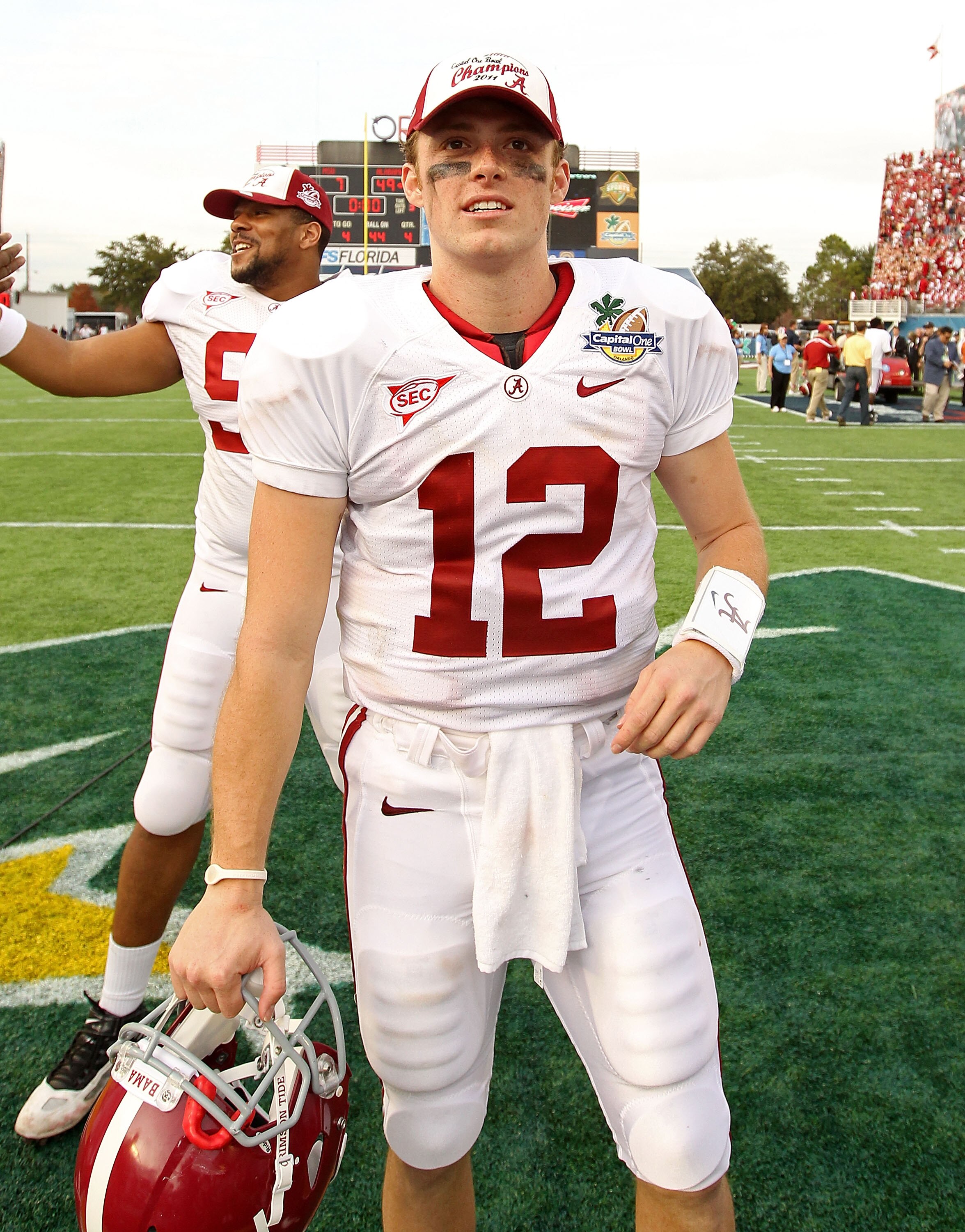 ORLANDO, FL - JANUARY 01:  Greg McElroy #12 of the Alabama Crimson Tide smiles after winning the Capitol One Bowl against the Michigan State Spartans at the Florida Citrus Bowl on January 1, 2011 in Orlando, Florida.  (Photo by Mike Ehrmann/Getty Images)