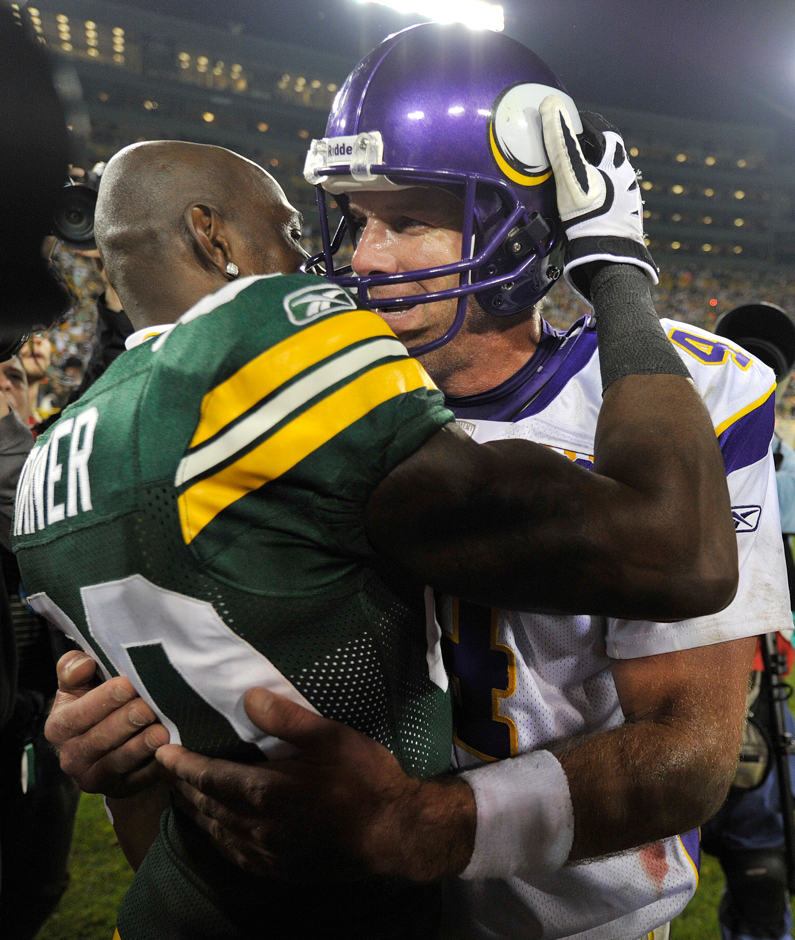 GREEN BAY, WI - OCTOBER 24: Donald Driver #80 of the Green Bay Packers and Brett Favre #4 of the Minnesota Vikings talk after the Packers defeated the Vikings 28-24 at Lambeau Field on October 24, 2010 in Green Bay, Wisconsin. (Photo by Jim Prisching/Ge GREEN BAY, WI - OCTOBER 24: Donald Driver #80 of the Green Bay Packers and Brett Favre #4 of the Minnesota Vikings talk after the Packers defeated the Vikings 28-24 at Lambeau Field on October 24, 2010 in Green Bay, Wisconsin. (Photo by Jim Prisching/Ge