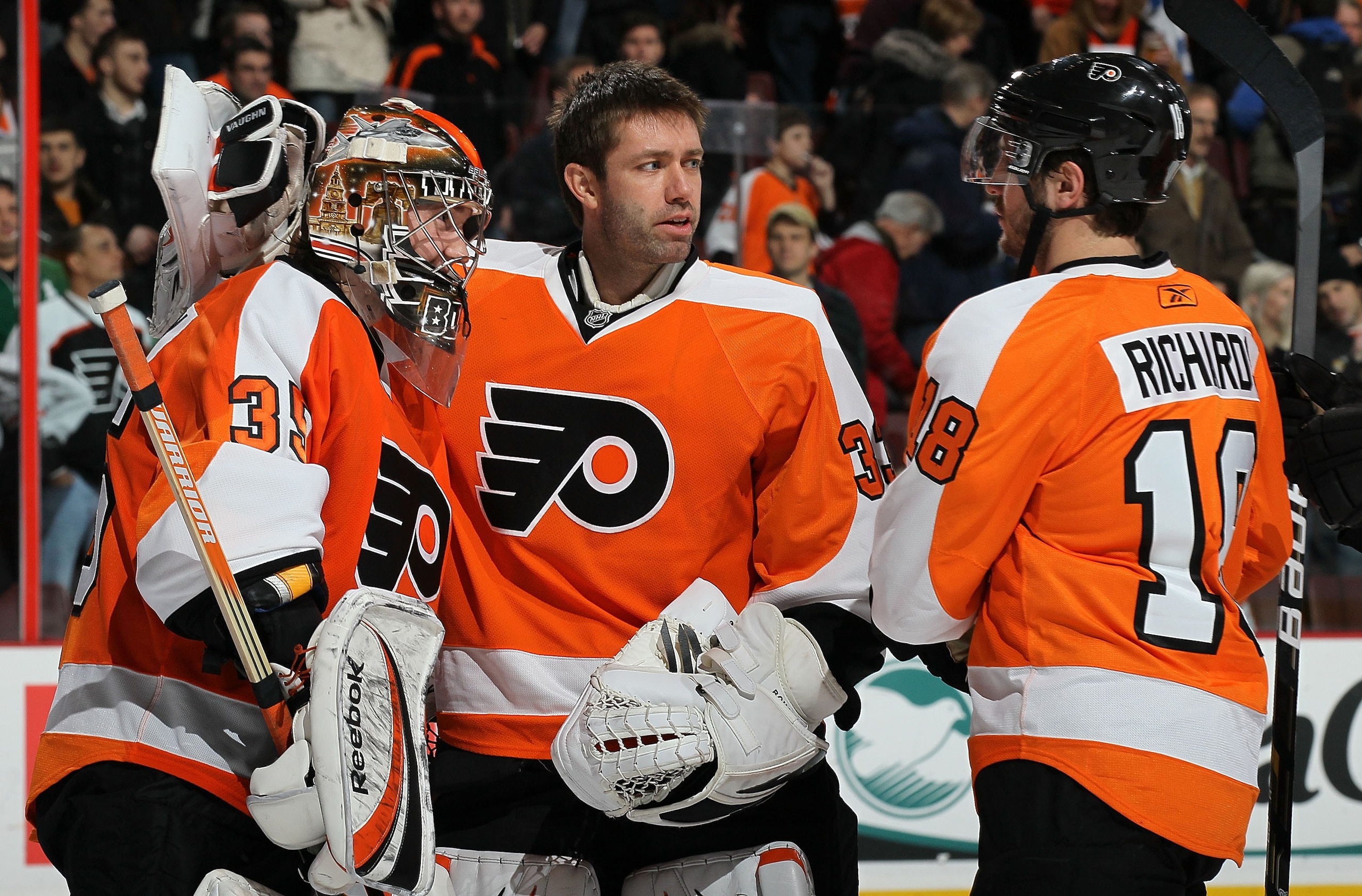 PHILADELPHIA, PA - JANUARY 20:  Sergei Bobrovsky #35, Brian Boucher #33 and Mike Richards #18 of the Philadelphia Flyers celebrate against the Ottawa Senators on January 20, 2011 at Wells Fargo Center in Philadelphia, Pennsylvania.  (Photo by Jim McIsaac/