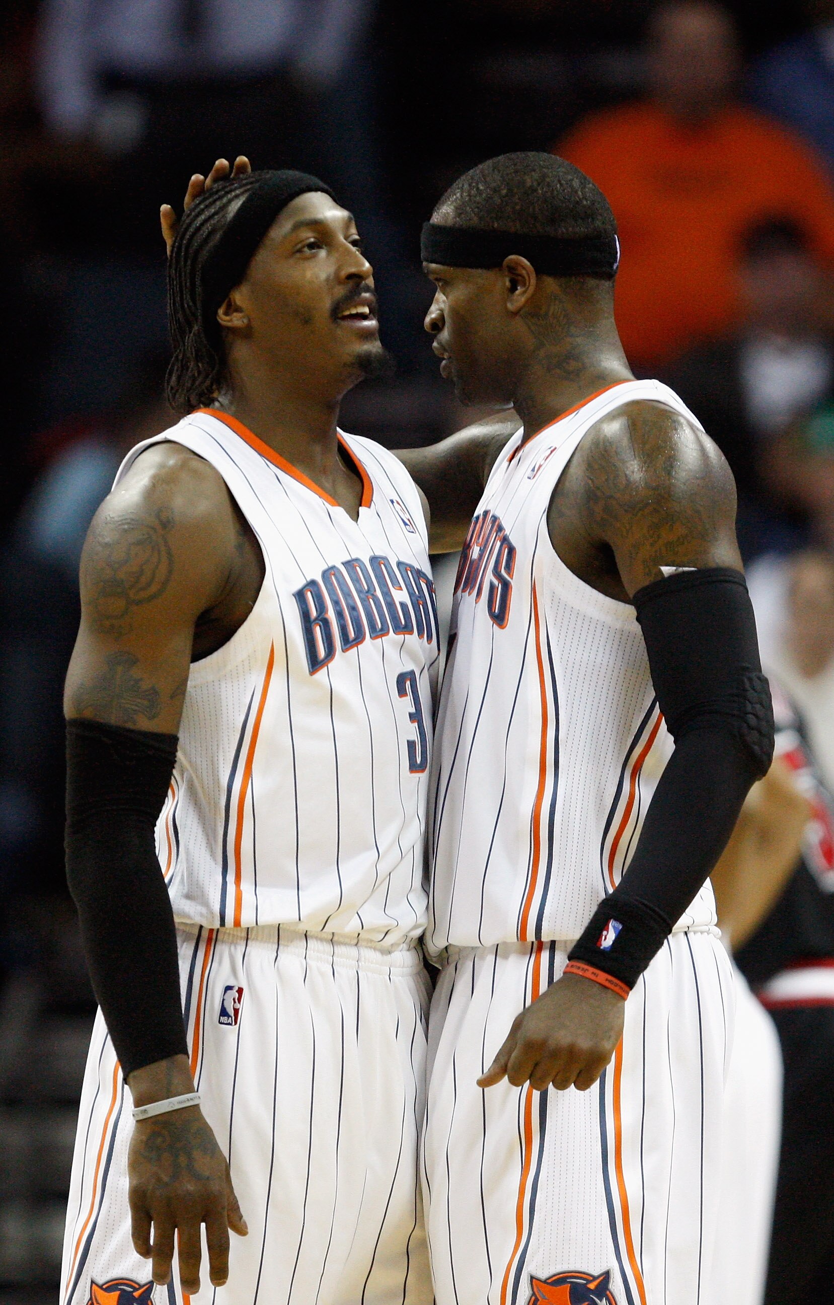 CHARLOTTE, NC - JANUARY 12: Teammates Gerald Wallace #3 and Stephen Jackson #1 of the Charlotte Bobcats react during their 96-91 victory over the Chicago Bulls at Time Warner Cable Arena on January 12, 2011 in Charlotte, North Carolina. NOTE TO USER: Use