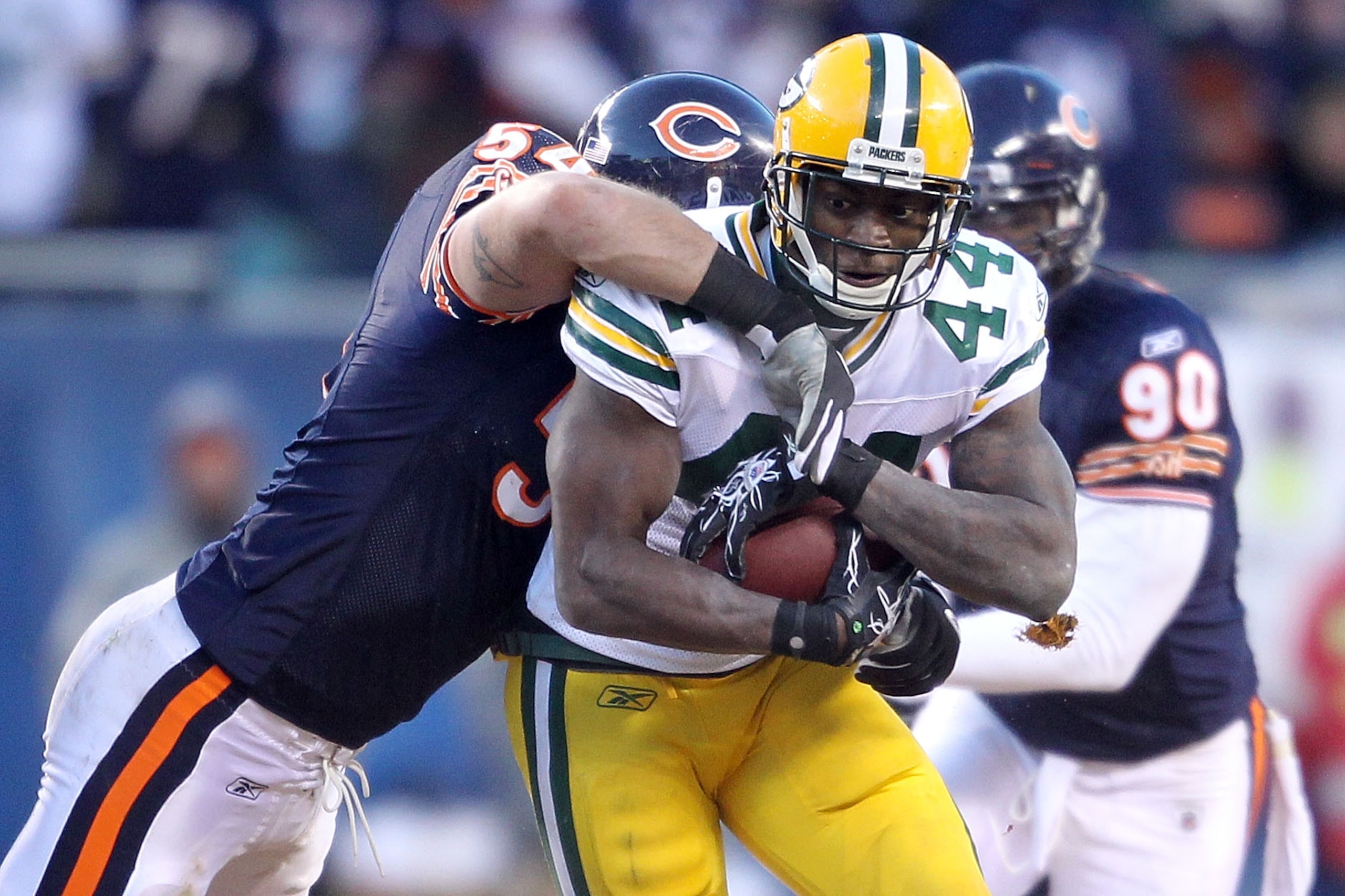 CHICAGO, IL - JANUARY 23: James Starks #44 of the Green Bay Packers runs the ball as he is hit by Brian Urlacher #54 of the Chicago Bears in the NFC Championship Game at Soldier Field on January 23, 2011 in Chicago, Illinois. (Photo by Andy Lyons/Getty CHICAGO, IL - JANUARY 23: James Starks #44 of the Green Bay Packers runs the ball as he is hit by Brian Urlacher #54 of the Chicago Bears in the NFC Championship Game at Soldier Field on January 23, 2011 in Chicago, Illinois. (Photo by Andy Lyons/Getty