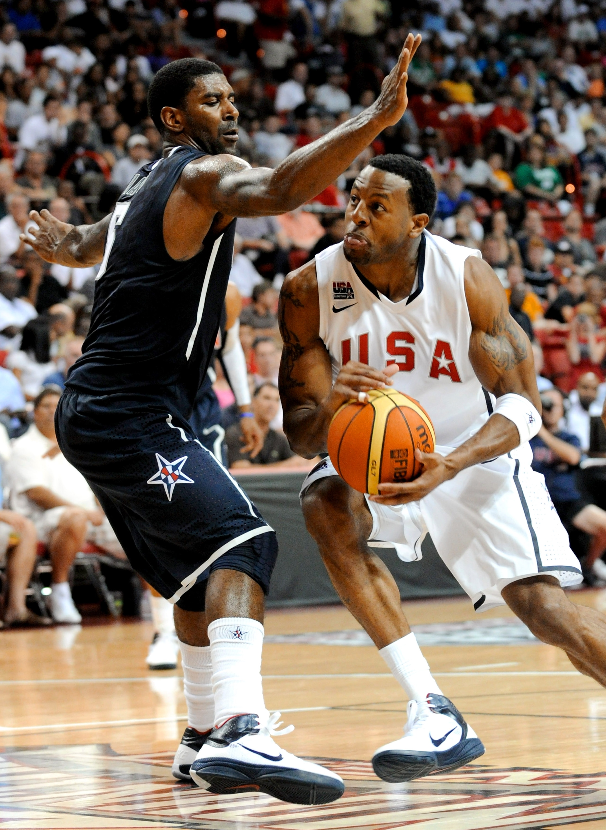 LAS VEGAS - JULY 24:  Andre Iguodala #9 (R) of the 2010 USA Basketball Men's National Team drives against O.J. Mayo #5 of the 2010 USA Basketball Men's National Team during a USA Basketball showcase at the Thomas & Mack Center on July 24, 2010 in Las Vega