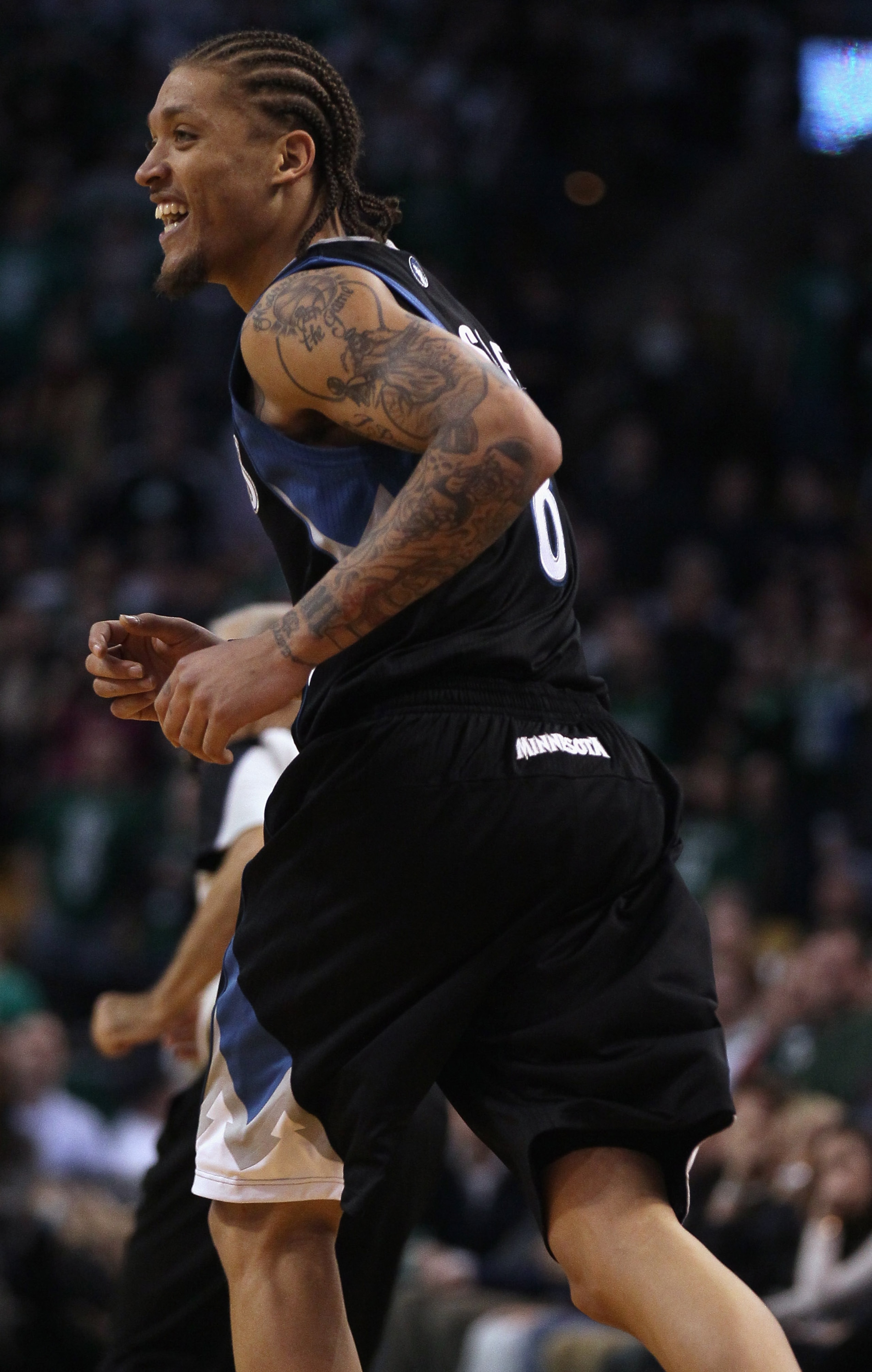 BOSTON, MA - JANUARY 03:  Michael Beasley #8 of the Minnesota Timberwolves celebrates his three point shot in the fourth quarter against the Boston Celtics on January 3, 2011 at the TD Garden in Boston, Massachusetts. The Celtics defeated the Timberwolves