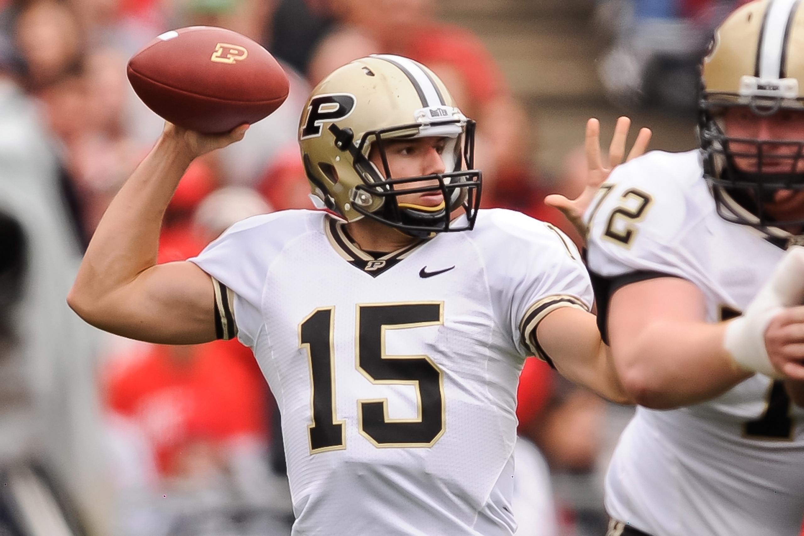 COLUMBUS, OH - OCTOBER 23:  Quarterback Rob Henry #15 of the Purdue Boilermakers drops back to pass against the Ohio State Buckeyes at Ohio Stadium on October 23, 2010 in Columbus, Ohio.  (Photo by Jamie Sabau/Getty Images)