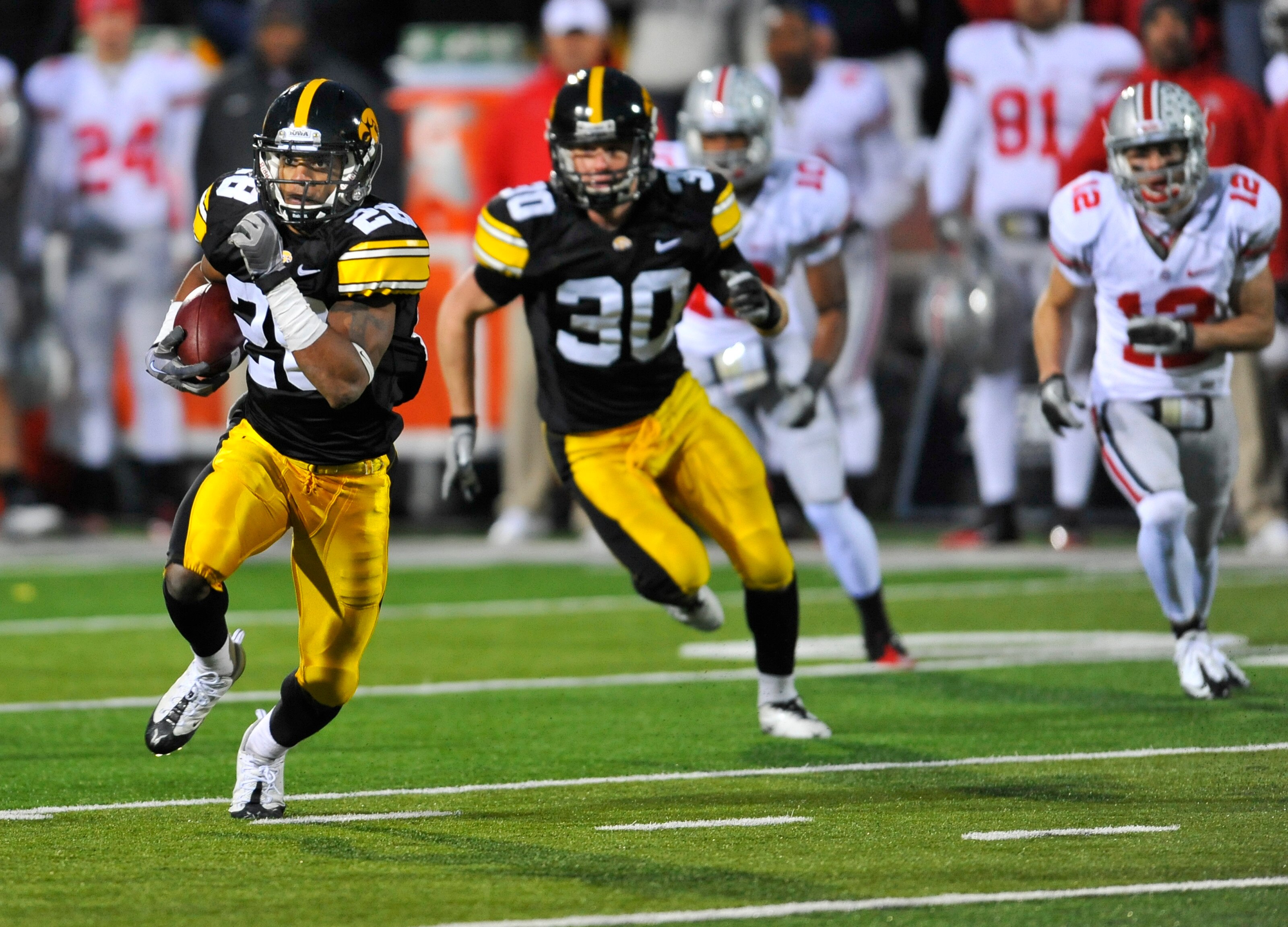IOWA CITY, IA - NOVEMBER 20: Defensive back Shaun Prater #28 of the University of Iowa Hawkeyes returns a pass interception against the Ohio State Buckeyes during the second half of play at Kinnick Stadium on November 20, 2010 in Iowa City, Iowa. Ohio Sta