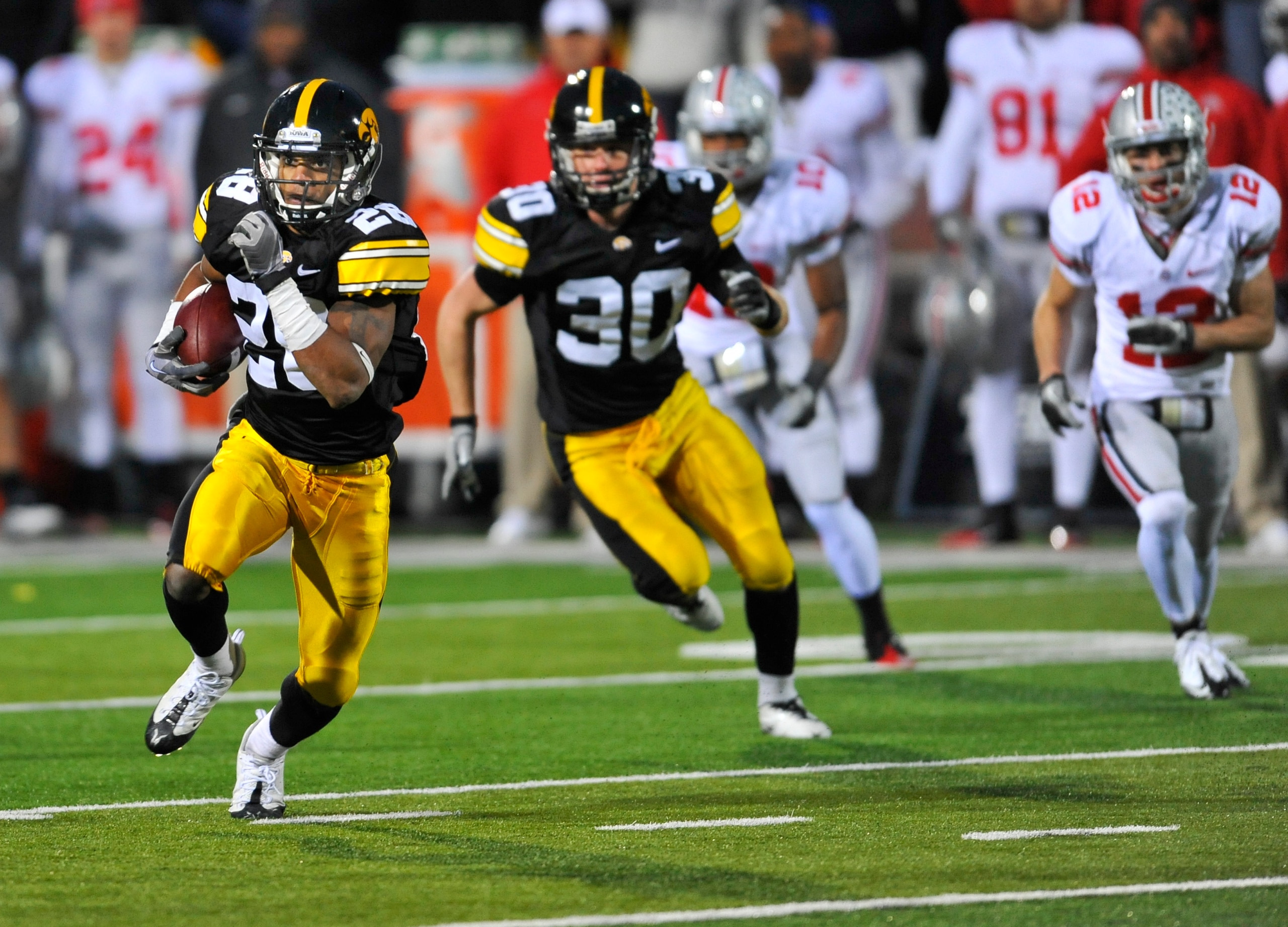 IOWA CITY, IA - NOVEMBER 20: Defensive back Shaun Prater #28 of the University of Iowa Hawkeyes returns a pass interception against the Ohio State Buckeyes during the second half of play at Kinnick Stadium on November 20, 2010 in Iowa City, Iowa. Ohio Sta