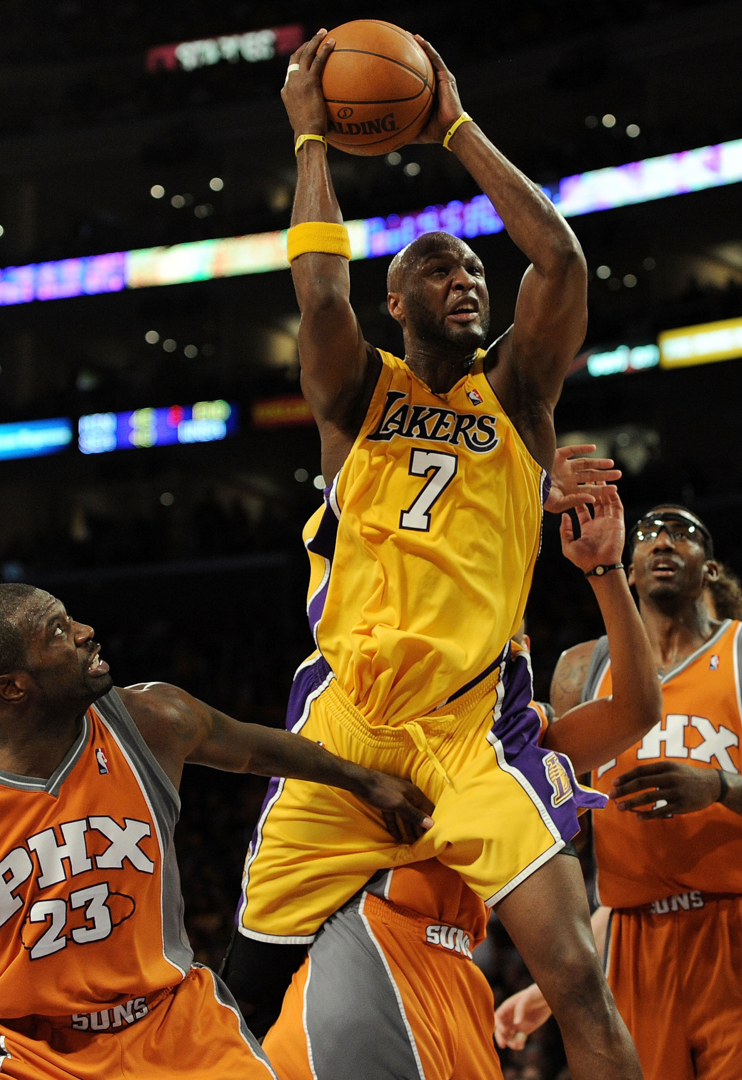 LOS ANGELES, CA - MAY 19:  Lamar Odom #7 of the Los Angeles Lakers grabs a rebound against the Phoenix Suns in the fourth quarter of Game Two of the Western Conference Finals during the 2010 NBA Playoffs at Staples Center on May 19, 2010 in Los Angeles, C