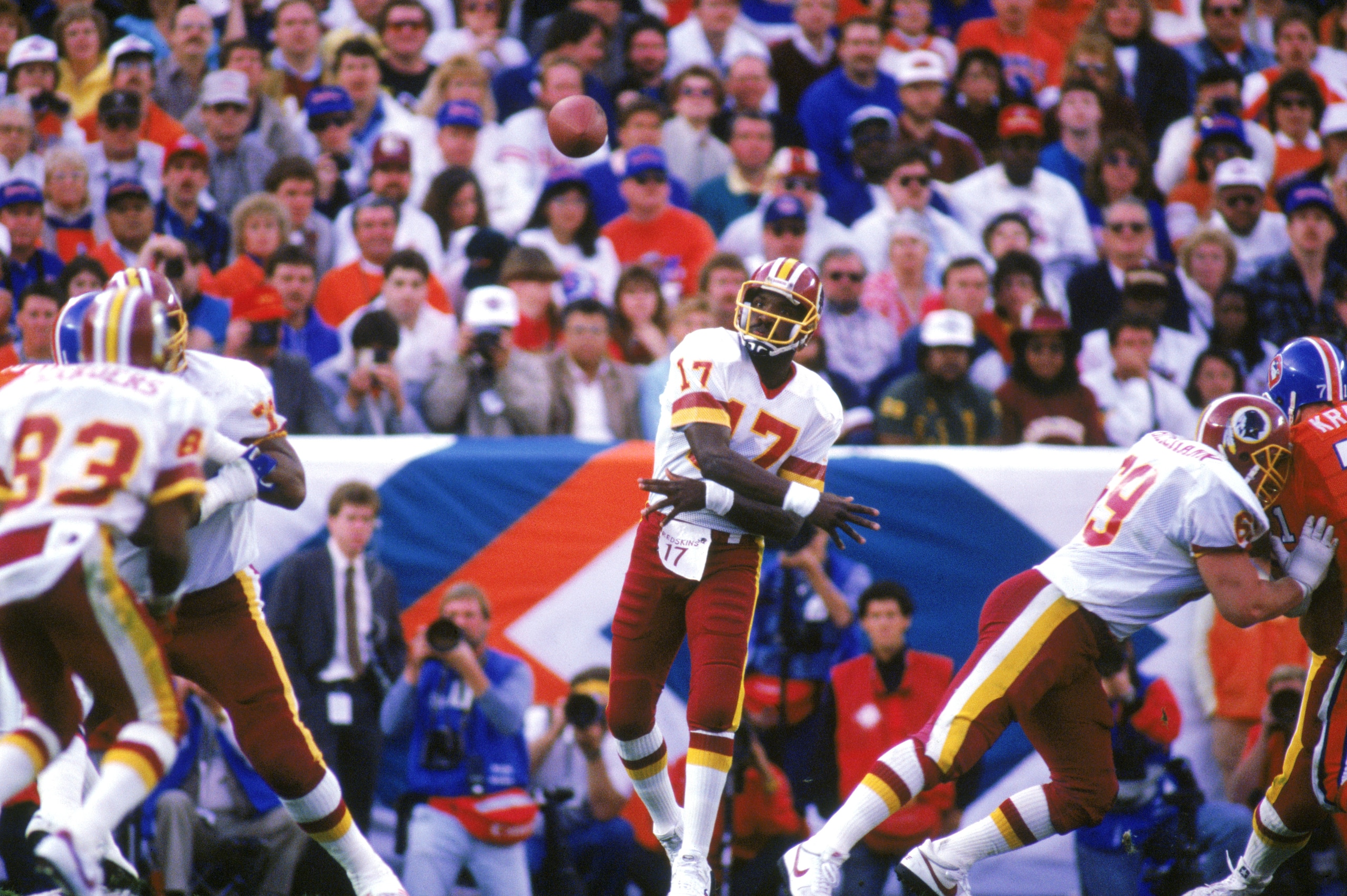 SAN DIEGO - JANUARY 31:  Quarterback Doug Williams #17 of the Washington Redskins passes during Super Bowl XXII against the Denver Broncos at Jack Murphy Stadium on January 31, 1988 in San Diego, California.  The Redskins won 42-10.  (Photo by Stephen Dun