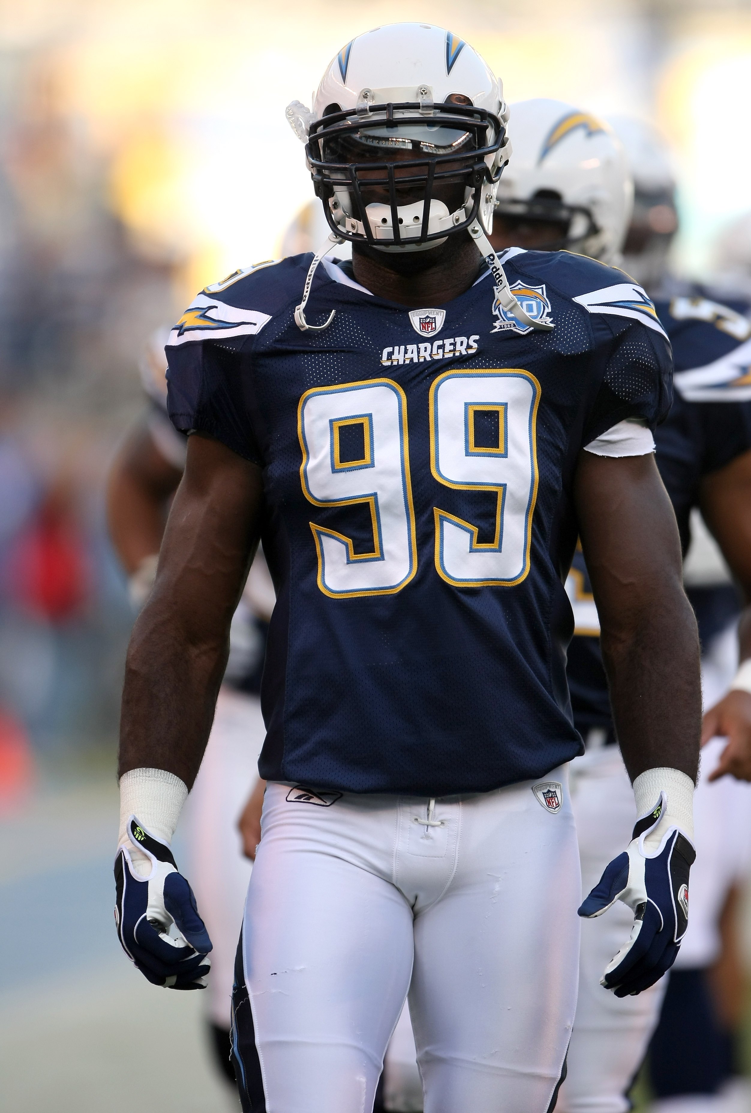 San Diego Chargers linebacker Kevin Burnett, right, runs for