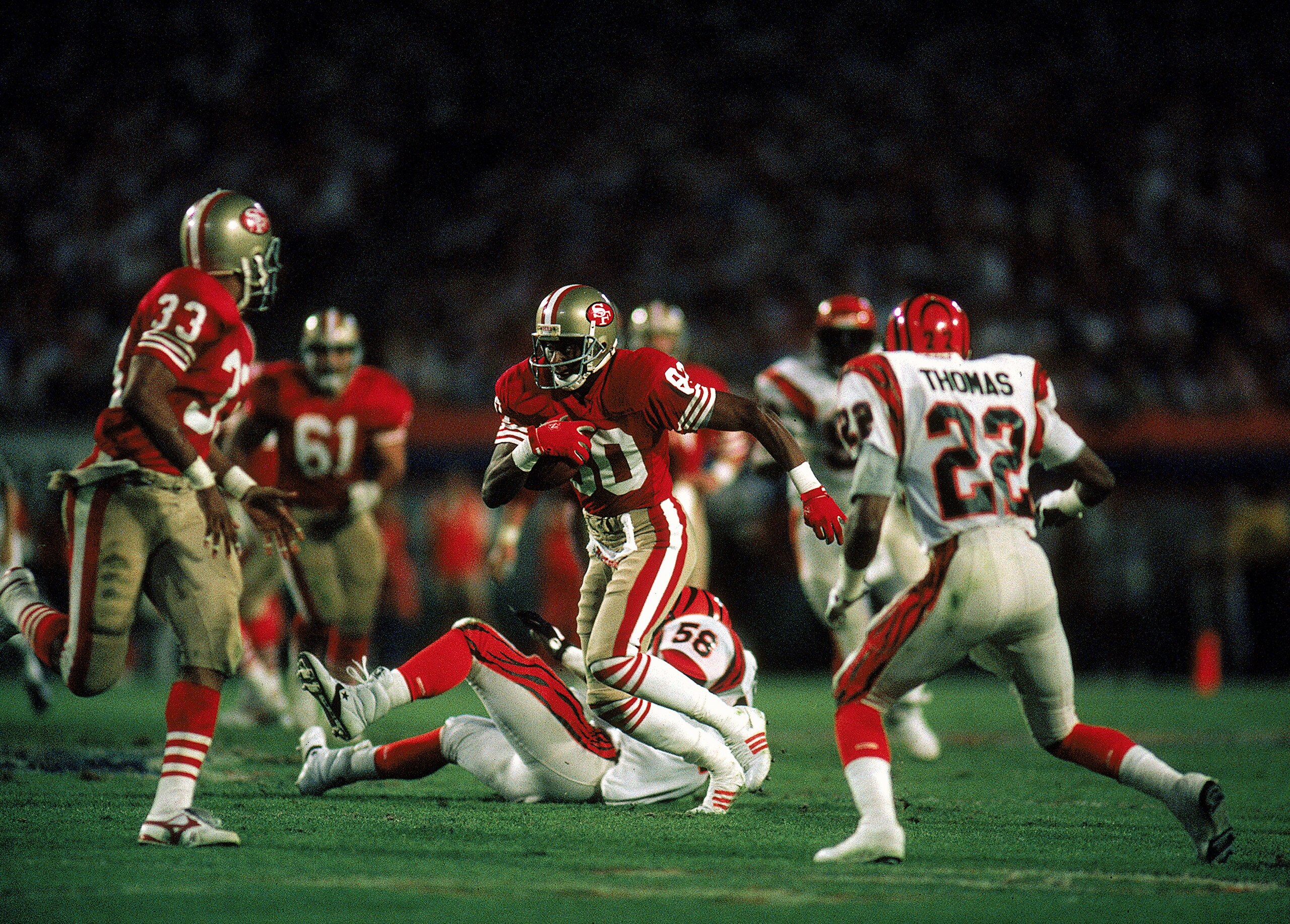 Jerry Rice #80 of the San Francisco 49ers carries the ball during the Super Bowl XXIII against the Cincinnati Bengals, January 22, 1989. The 49ers defeated the Bengals 20-10. Mandatory Credit: Mike Powell  /Allsport