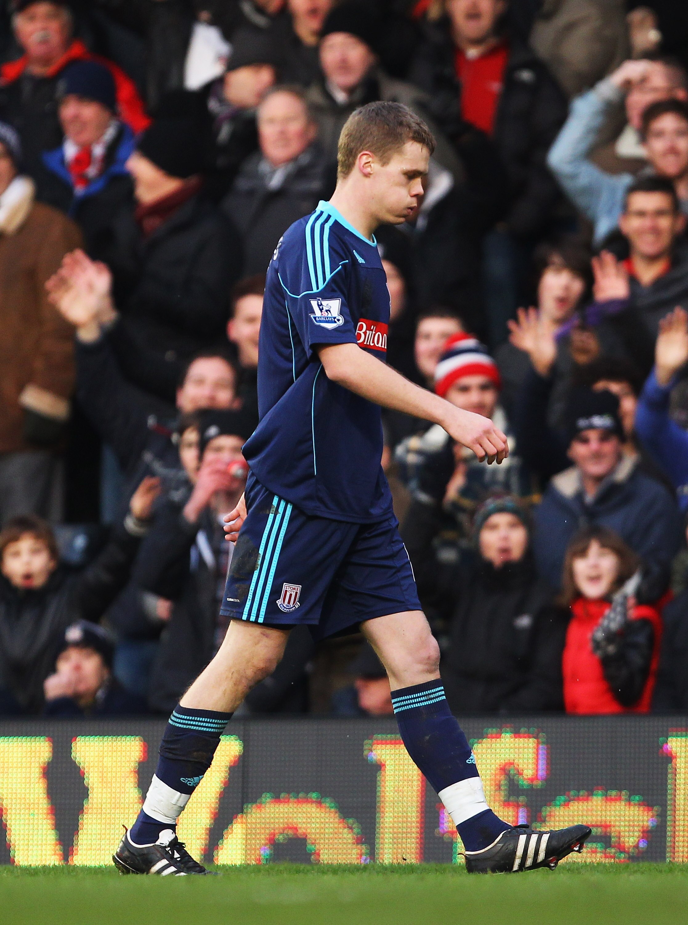 LONDON, ENGLAND - JANUARY 22: Ryan Shawcross of Stoke City leaves the field after being shown the red card during the Barclays Premier League match between Fulham and Stoke City at Craven Cottage on January 22, 2011 in London, England.  (Photo by Clive Ro