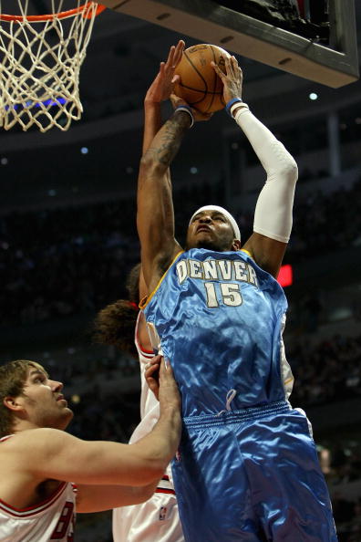 CHICAGO - FEBRUARY 22:  Carmelo Anthony #15 of the Denver Nuggets goes to the basket against the Chicago Bulls during the game on February 22, 2008 at the United Center in Chicago, Illinois. The Bulls won 135-121. NOTE TO USER: User expressly acknowledges