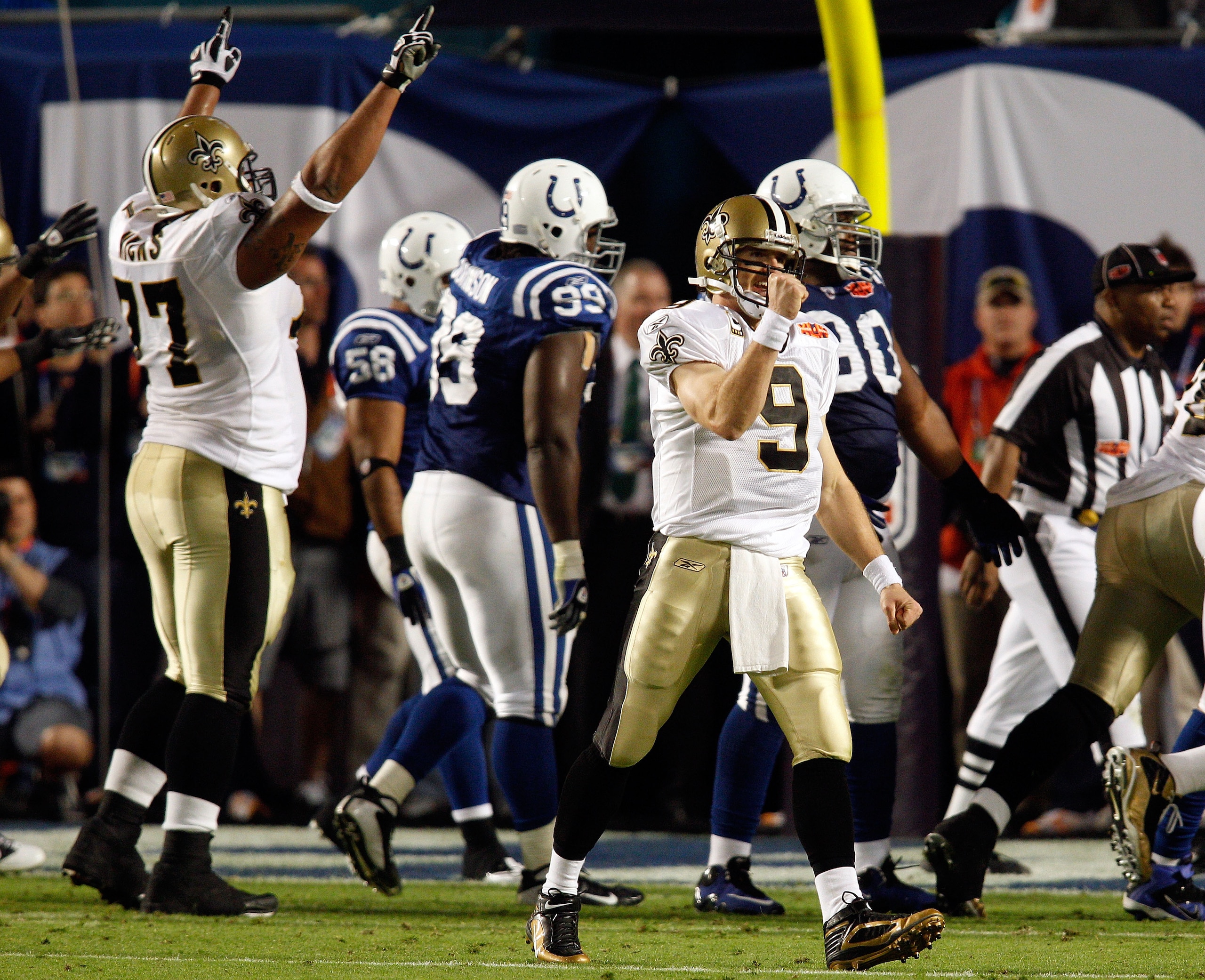 MIAMI GARDENS, FL - FEBRUARY 07:  Drew Brees #9  of the New Orleans Saints reacts to a touchdown pass to Jeremy Shockey during Super Bowl XLIV on February 7, 2010 at Sun Life Stadium in Miami Gardens, Florida.  (Photo by Chris Graythen/Getty Images)