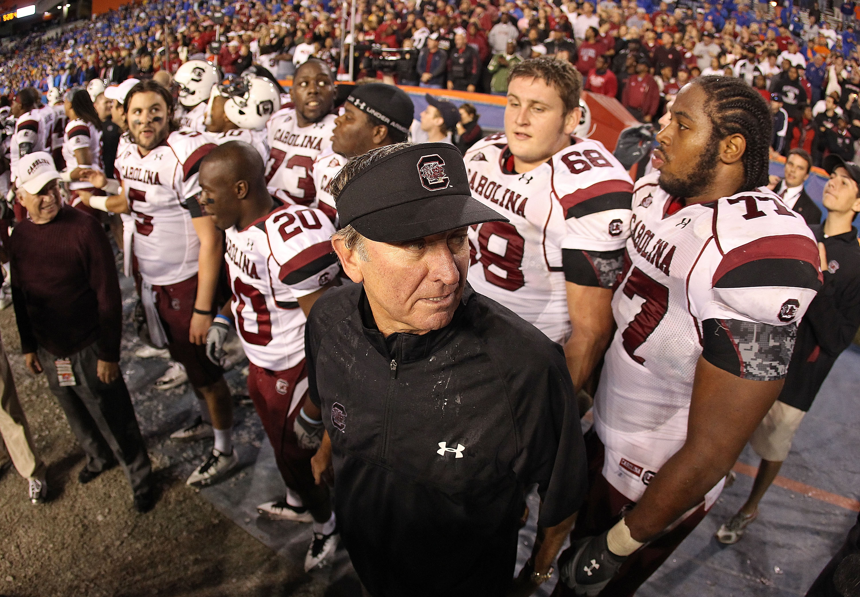 GAINESVILLE, FL - NOVEMBER 13:  South Carolina Gamecocks head coach Steve Spurrier greets his players after winning a game against the Florida Gators at Ben Hill Griffin Stadium on November 13, 2010 in Gainesville, Florida. The Gamecocks beat the Gators 3