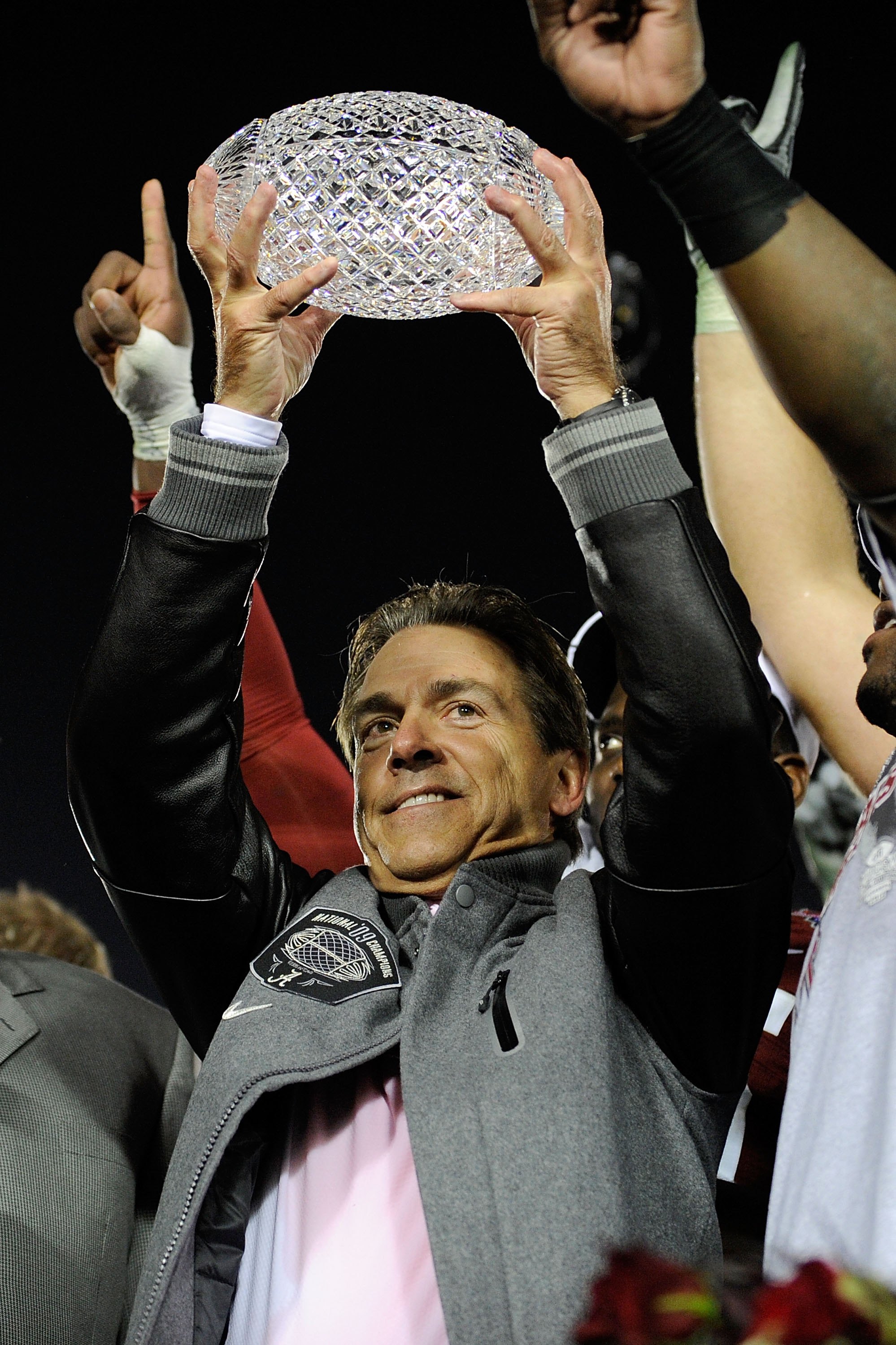 PASADENA, CA - JANUARY 07:  Head coach Nick Saban and the Alabama Crimson Tide celebrate with the BCS Championship trophy after winning the Citi BCS National Championship game over the Texas Longhorns at the Rose Bowl on January 7, 2010 in Pasadena, Calif