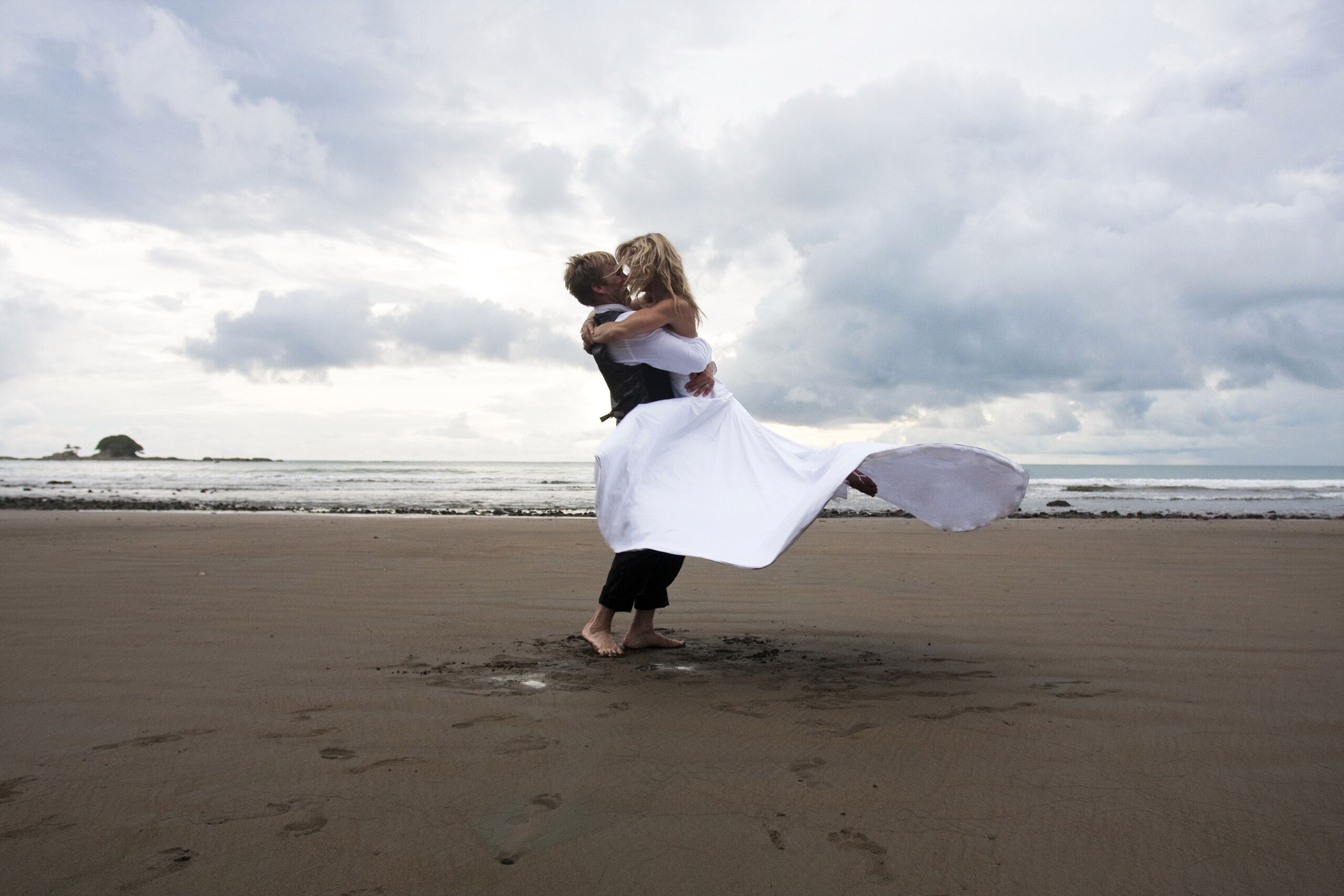 DOMINICAL, COSTA RICA - JUNE 19:  (R-L) In this handout provided by Gretchen Bleiler, Olympic snowboarder Gretchen Bleiler and Chris Hotell celebrate during their wedding on June 19, 2009 in Dominical, Costa Rica.  (Photo by Handout/Getty Images)