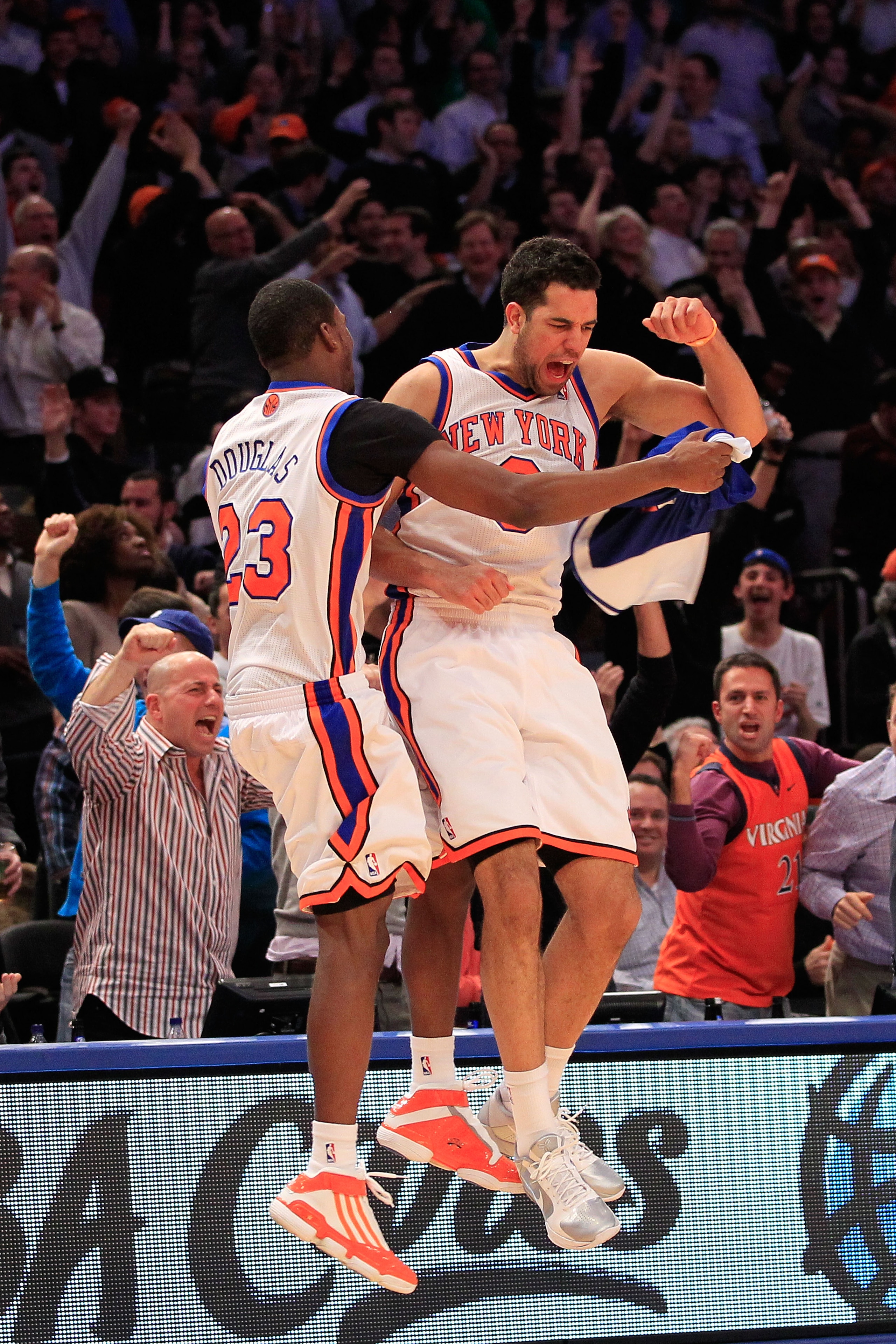 NEW YORK, NY - JANUARY 27:  Toney Douglas #23 celebrates with Landry Fields #6 of the New York Knicks after Landry shoots a three pointer against the Miami Heat at Madison Square Garden on January 27, 2011 in New York City. NOTE TO USER: User expressly ac