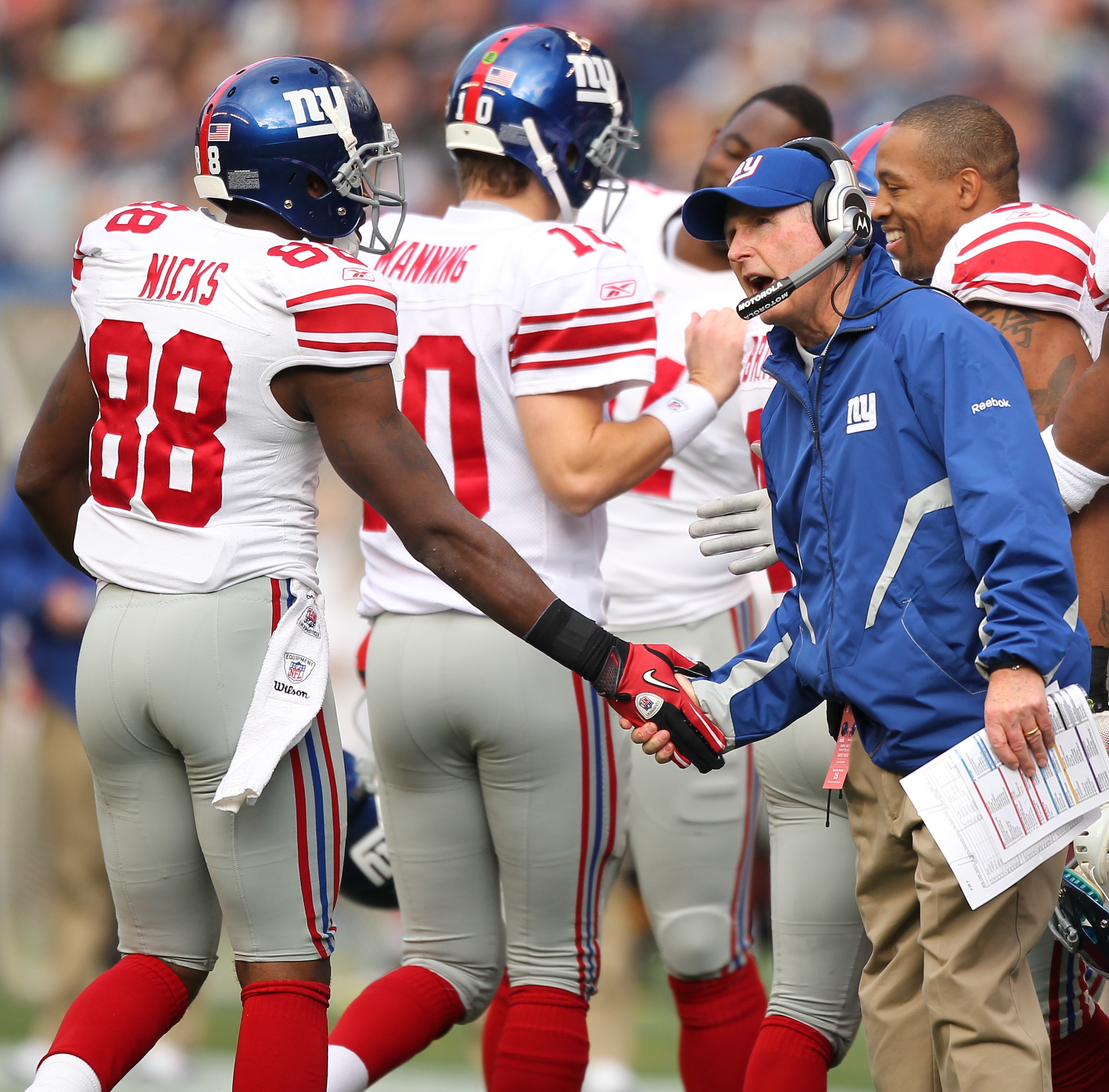SEATTLE - NOVEMBER 07:  Head coach Tom Coughlin of the New York Giants congratulates Hakeem Nicks #88 after Kevin Boss scored a touchdown against the Seattle Seahawks at Qwest Field on November 7, 2010 in Seattle, Washington. The Giants defeated the Seaha