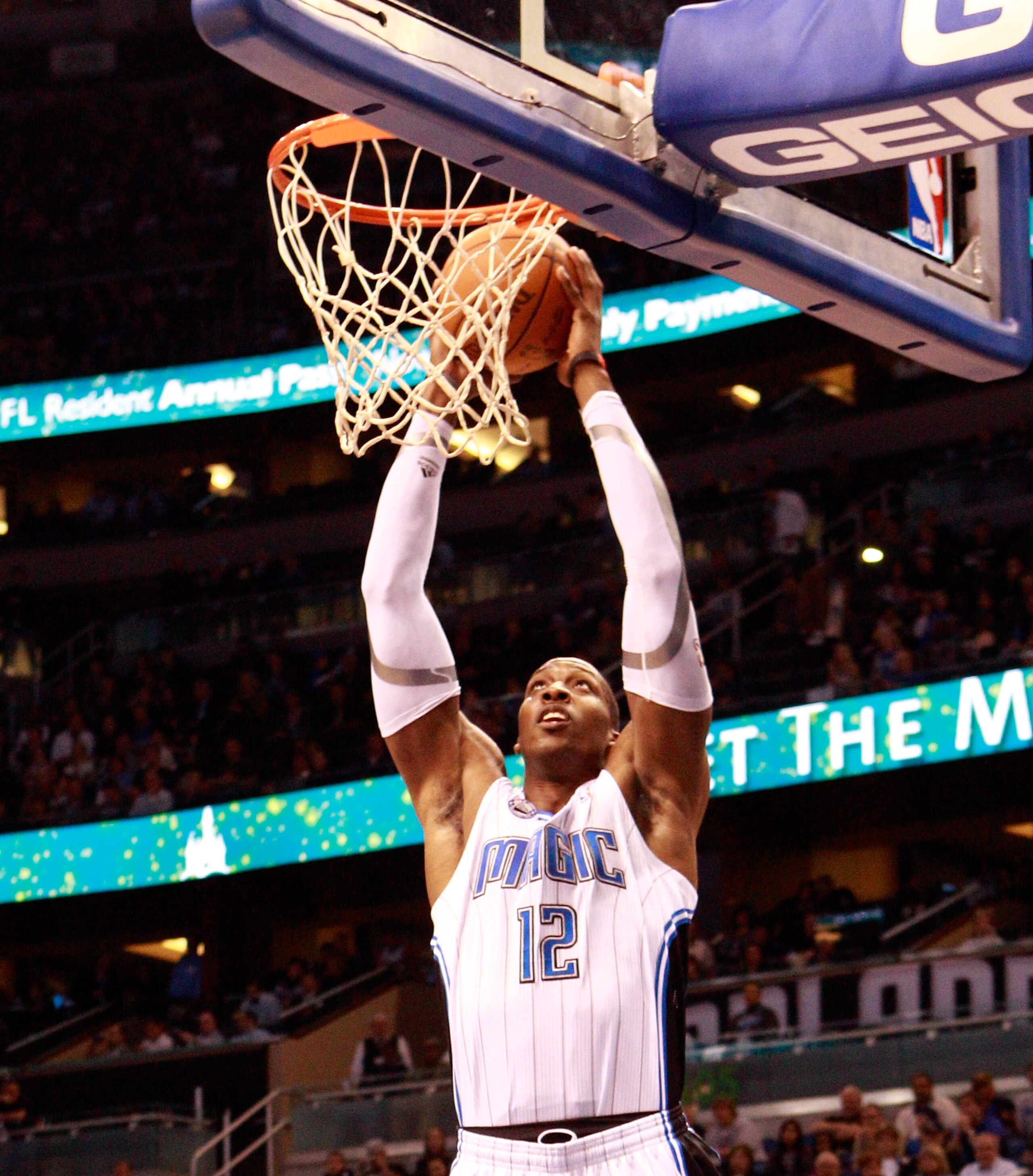 ORLANDO, FL - JANUARY 24:  Dwight Howard #12 of the Orlando Magic attempts a shot during the game against the Detroit Pistons at Amway Arena on January 24, 2011 in Orlando, Florida.  NOTE TO USER: User expressly acknowledges and agrees that, by downloadin