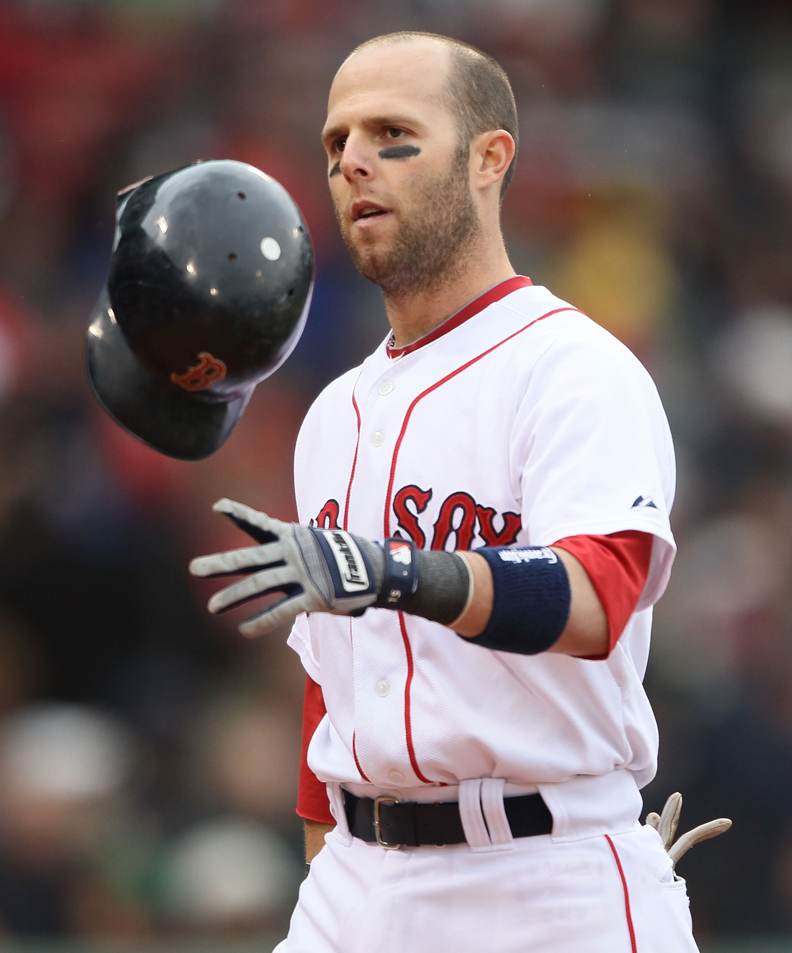 BOSTON - MAY 12:  Dustin Pedroia #15 of the Boston Red Sox reacts after he struck out in the eighth inning against the Toronto Blue Jays on May 12, 2010 at Fenway Park in Boston, Massachusetts.  (Photo by Elsa/Getty Images)