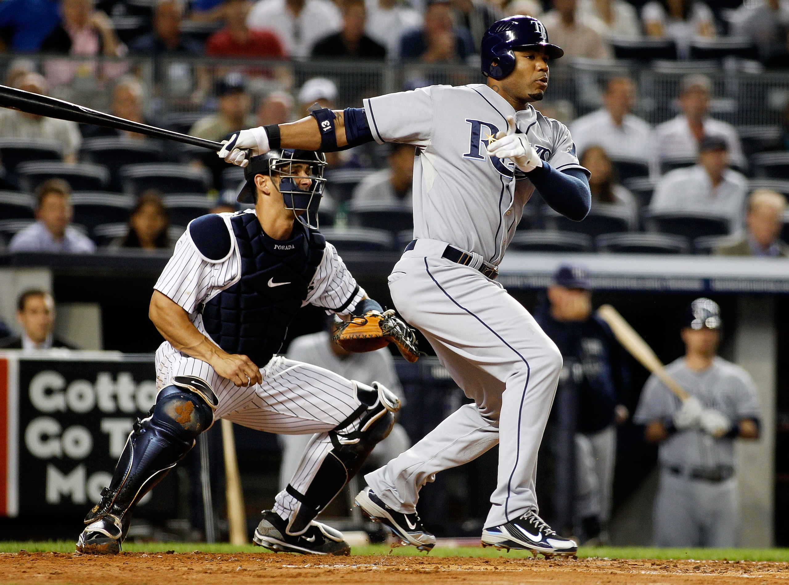 NEW YORK - SEPTEMBER 23: Carl Crawford ##13 of the Tampa Bay Rays grounds out in the first-inning against the New York Yankees on September 23, 2010 at Yankee Stadium in the Bronx borough of New York City. (Photo by Mike Stobe/Getty Images) NEW YORK - SEPTEMBER 23: Carl Crawford ##13 of the Tampa Bay Rays grounds out in the first-inning against the New York Yankees on September 23, 2010 at Yankee Stadium in the Bronx borough of New York City. (Photo by Mike Stobe/Getty Images)