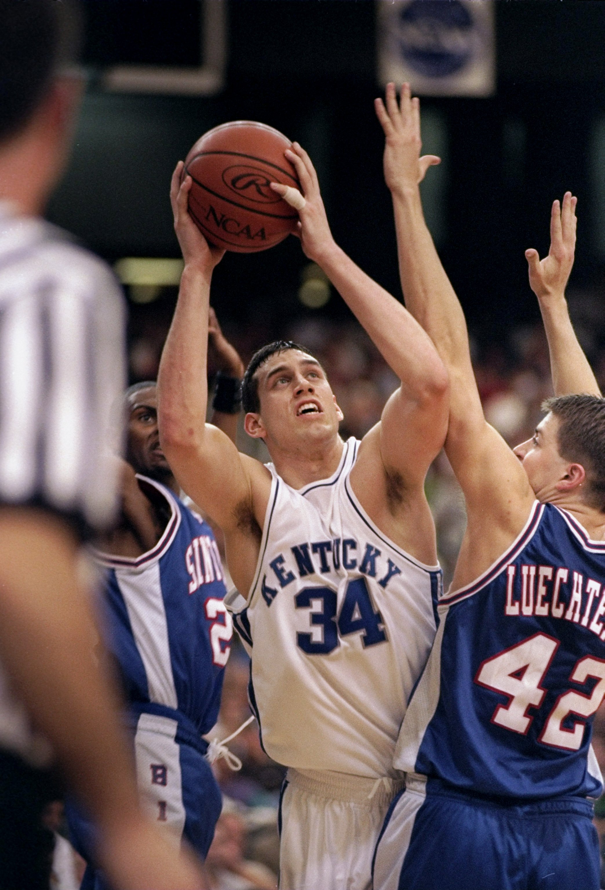 15 Mar 1998:  Forward Scott Padgett of the Kentucky Wildcats in action against forward Ryan Luechtefeld of the Saint Louis Billikens (right) during a game in the second round of the NCAA Tournament at the Georgia Dome in Atlanta, Georgia.  Kentucky defeat