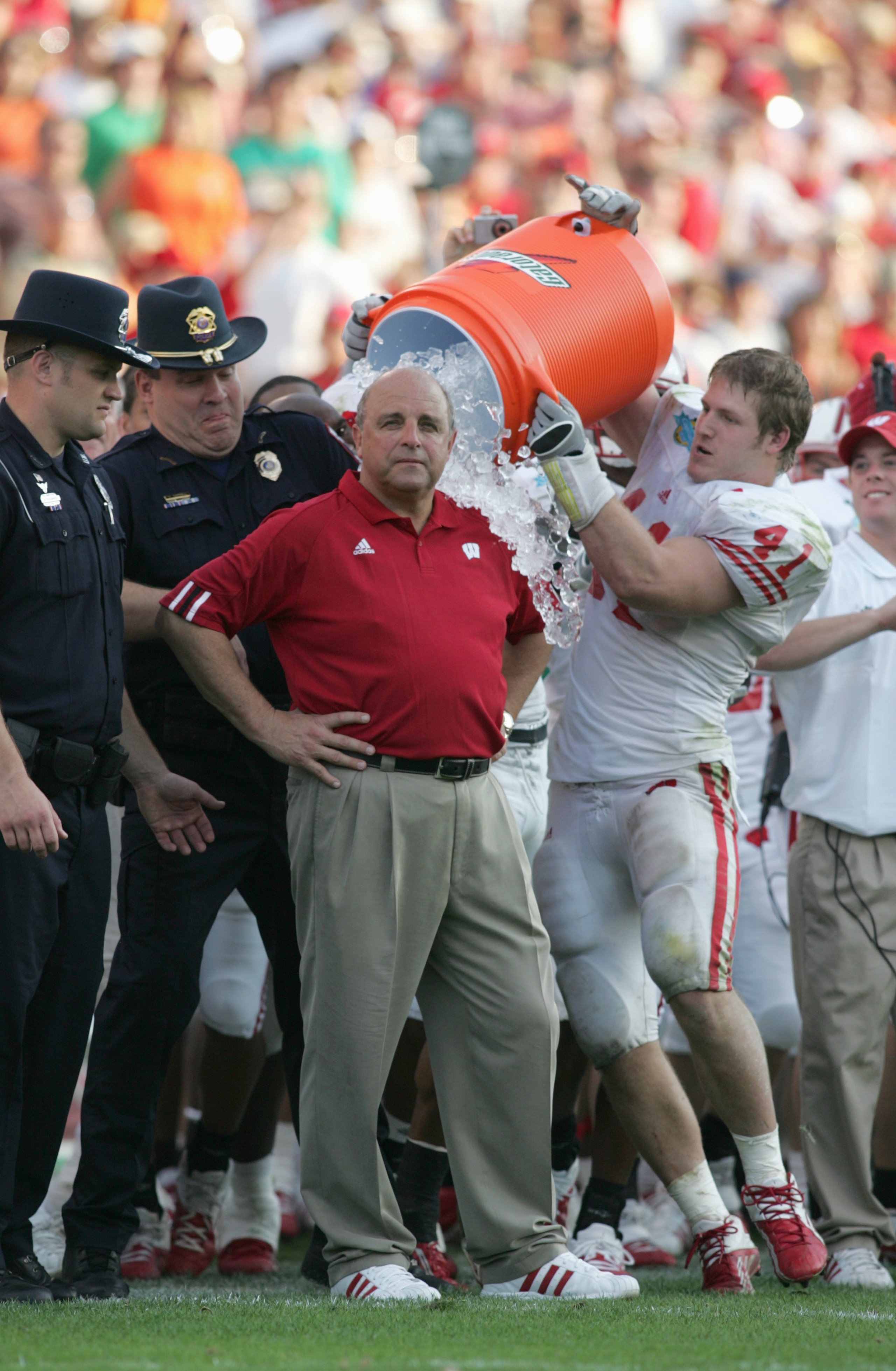 ORLANDO, FL - JANUARY 2: Head coach Barry Alvarez of the Wisconsin Badgers gets the gatorade dousing on the sidelines during the Capital One Bowl against the Auburn Tigers at the Florida Citrus Bowl on January 2, 2006 in Orlando, Florida. (Photo by Doug ORLANDO, FL - JANUARY 2: Head coach Barry Alvarez of the Wisconsin Badgers gets the gatorade dousing on the sidelines during the Capital One Bowl against the Auburn Tigers at the Florida Citrus Bowl on January 2, 2006 in Orlando, Florida. (Photo by Doug