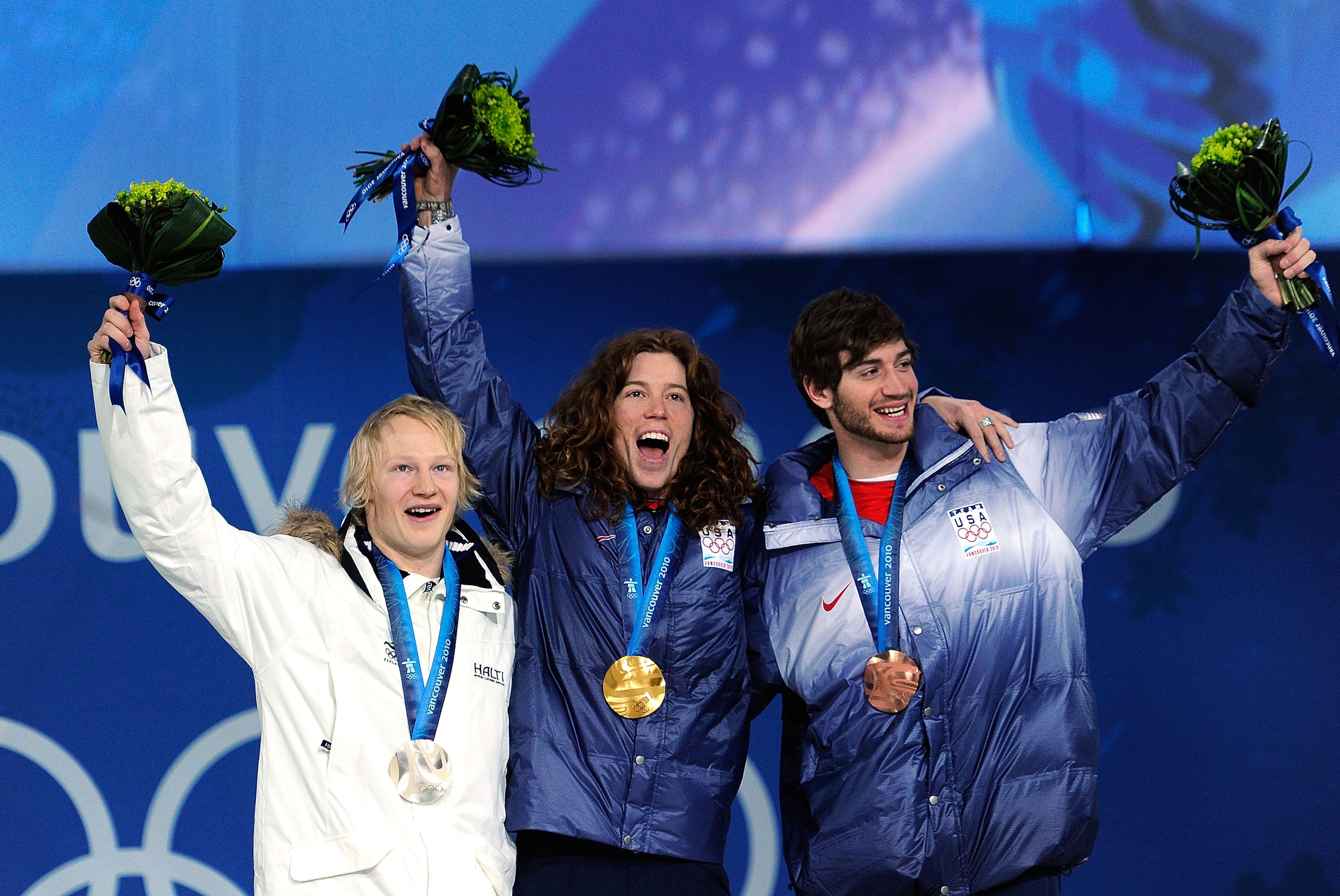 VANCOUVER, BC - FEBRUARY 18:  (L-R) Peetu Piiroinen of Finland celebrates winning the Silver, Shaun White of United States Gold, and Scott Lago of United States Bronze during the medal ceremony for the Menï¿½s Halfpipe on day 7 of the Vancouver 2010 Winter