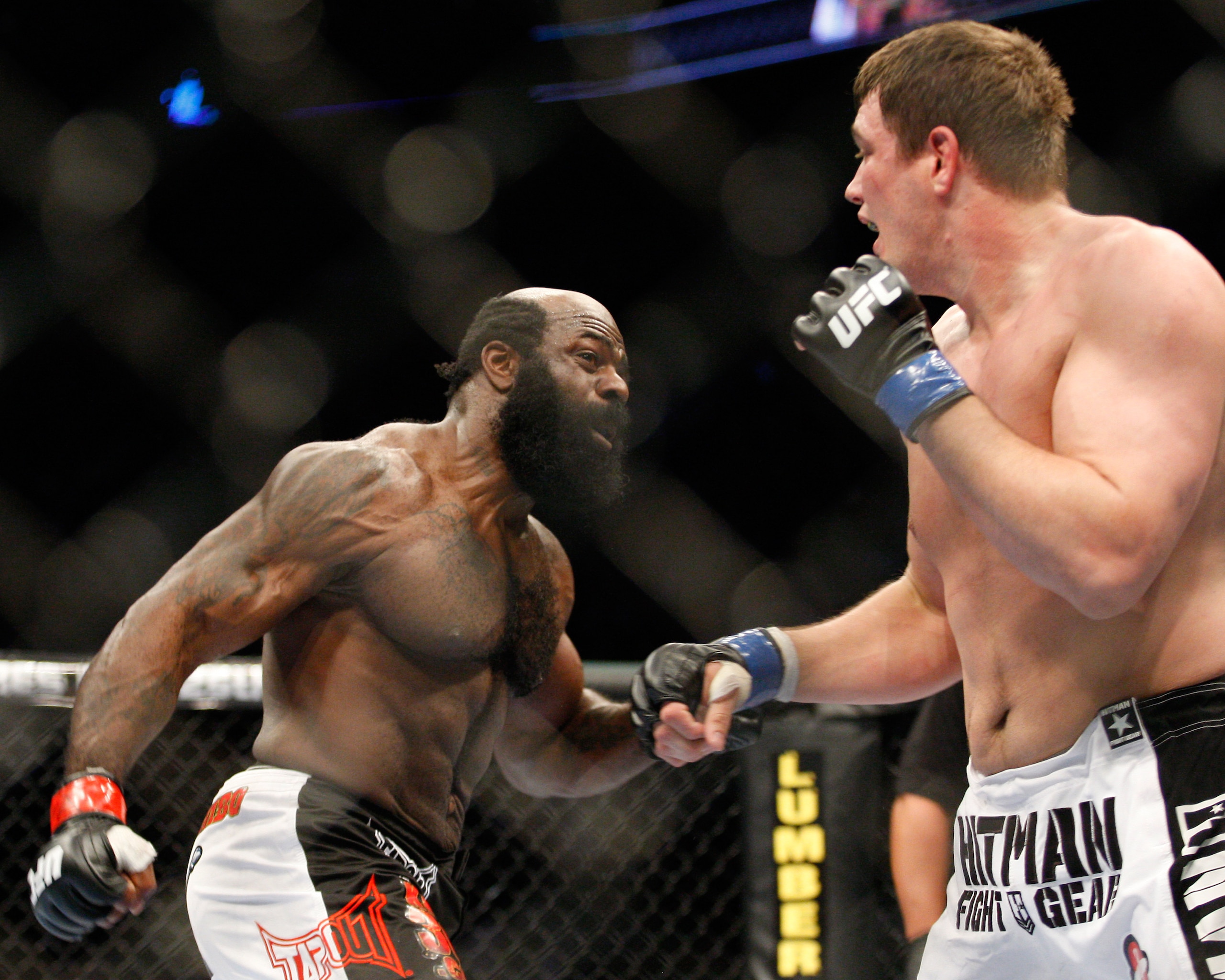 MONTREAL- MAY 8: Kimbo Slice (L) punches Matt Mitrione in their heavyweight bout at UFC 113 at Bell Centre on May 8, 2010 in Montreal, Quebec, Canada.  (Photo by Richard Wolowicz/Getty Images)