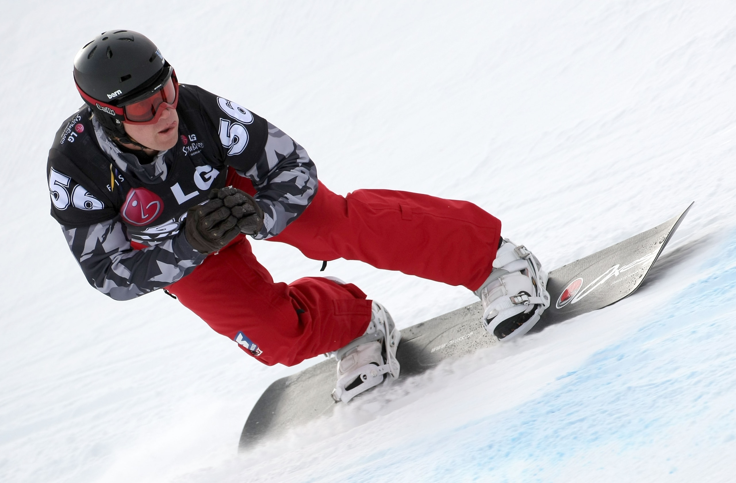 TELLURIDE, CO - DECEMBER 18:  Ross Powers of the USA takes a run during FIS Snowbaordcross World Cup Qualifications on December 18, 2009 in Telluride, Colorado. Powers finished sixth to advance to the finals.  (Photo by Doug Pensinger/Getty Images)