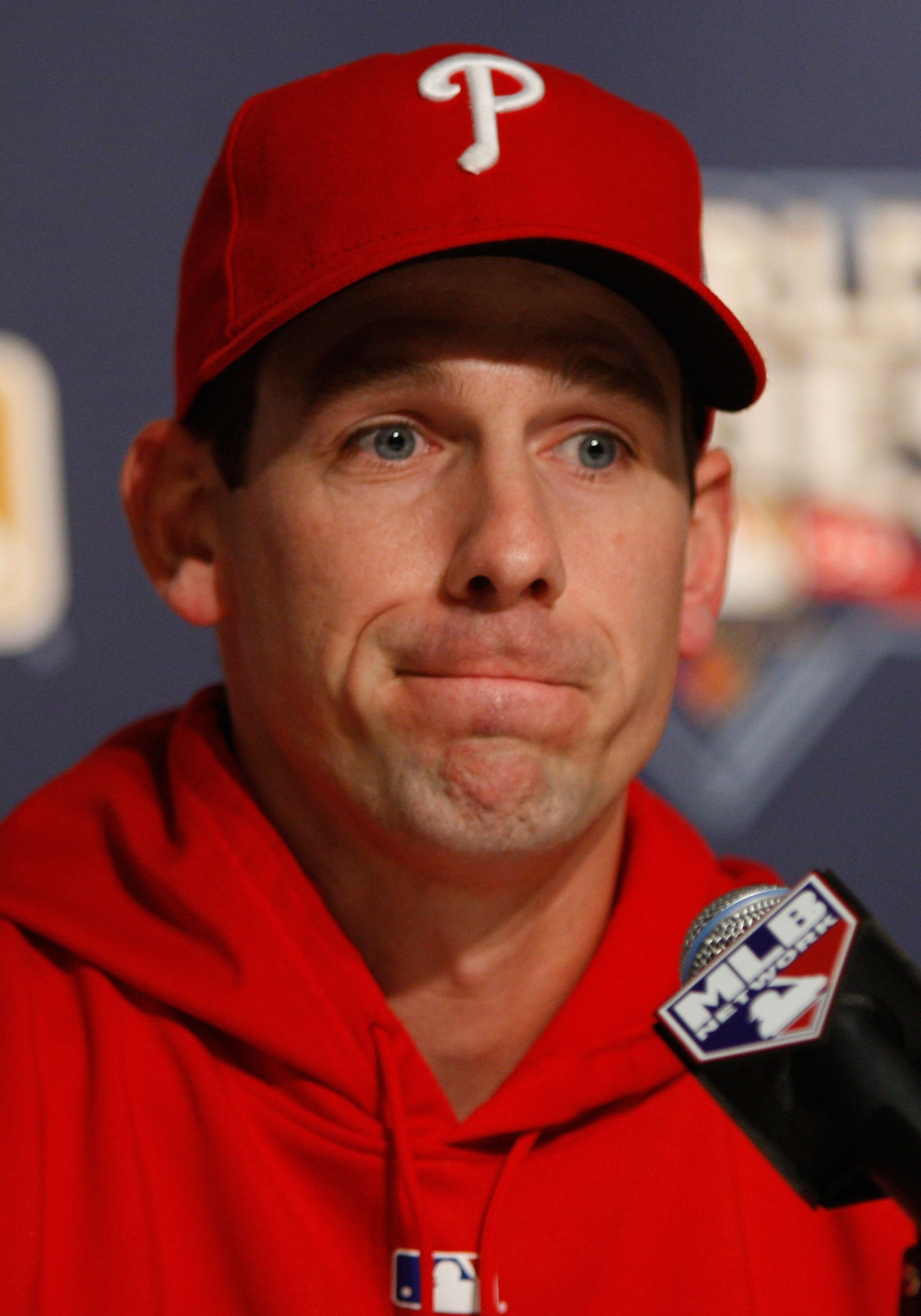 NEW YORK - OCTOBER 27:  Cliff Lee #34 of the Philadelphia Phillies speaks to the media after World Series workouts on October 27, 2009 at Yankee Stadium in the Bronx borough of New York City.  (Photo by Jared Wickerham/Getty Images)