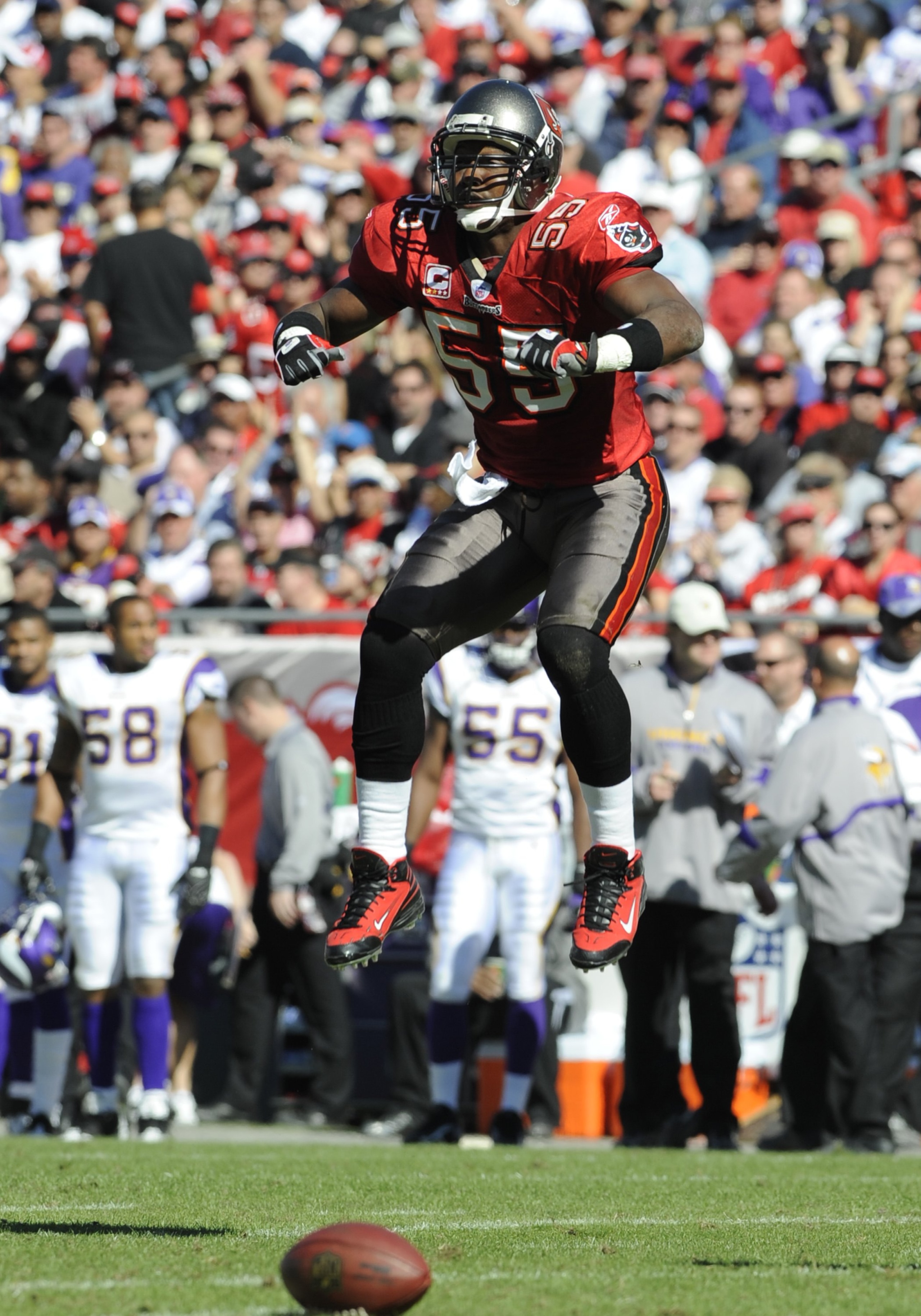 TAMPA, FL - NOVEMBER 16: Linebacker Derrick Brooks #55 of the Tampa Bay Buccaneers warms up with a leap against the Minnesota Vikings at Raymond James Stadium on November 16, 2008 in Tampa, Florida. (Photo by Al Messerschmidt/Getty Images) TAMPA, FL - NOVEMBER 16: Linebacker Derrick Brooks #55 of the Tampa Bay Buccaneers warms up with a leap against the Minnesota Vikings at Raymond James Stadium on November 16, 2008 in Tampa, Florida. (Photo by Al Messerschmidt/Getty Images)