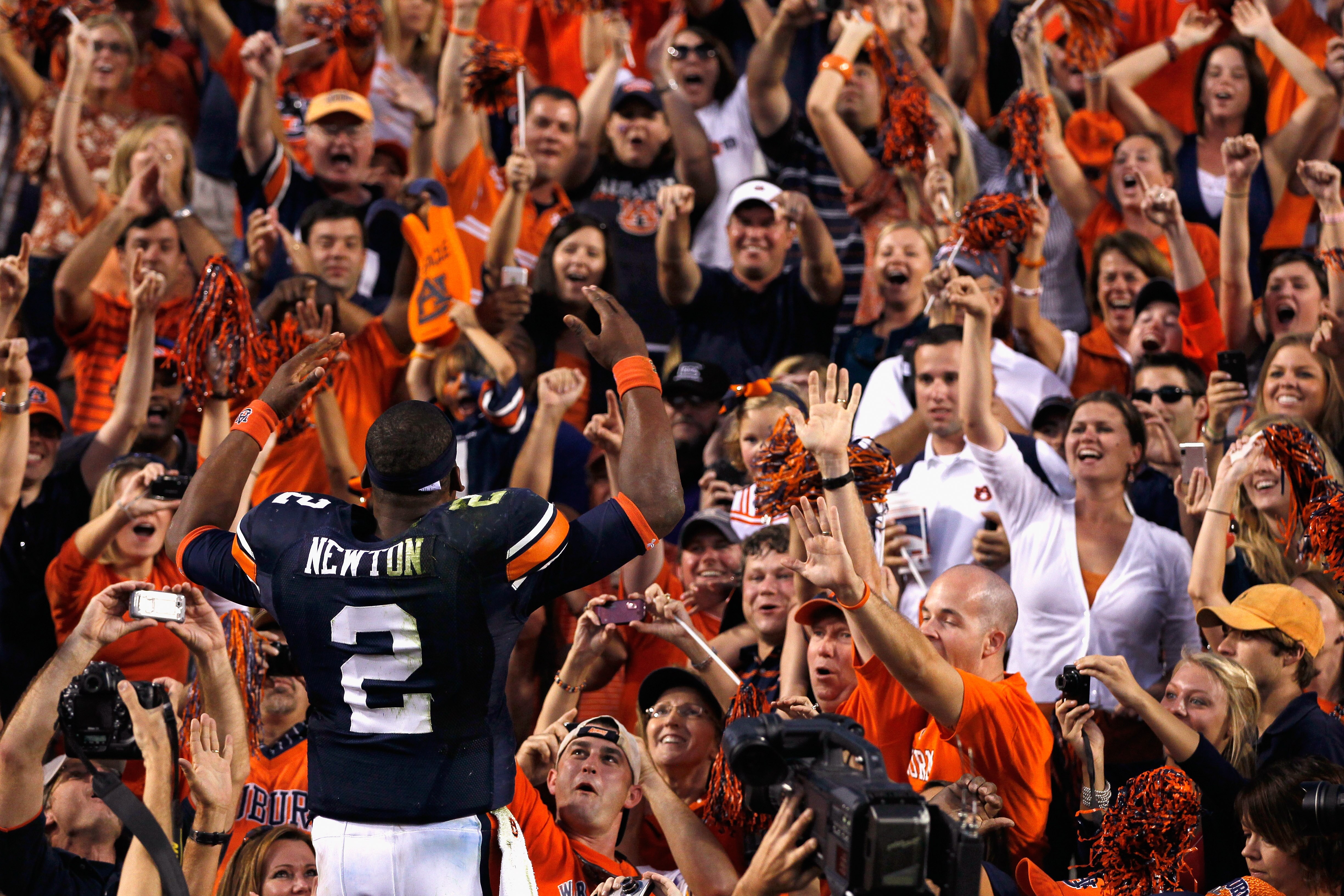 AUBURN, AL - OCTOBER 23:  Quarterback Cameron Newton #2 of the Auburn Tigers celebrates with fans against the LSU Tigers at Jordan-Hare Stadium on October 23, 2010 in Auburn, Alabama.  (Photo by Kevin C. Cox/Getty Images)