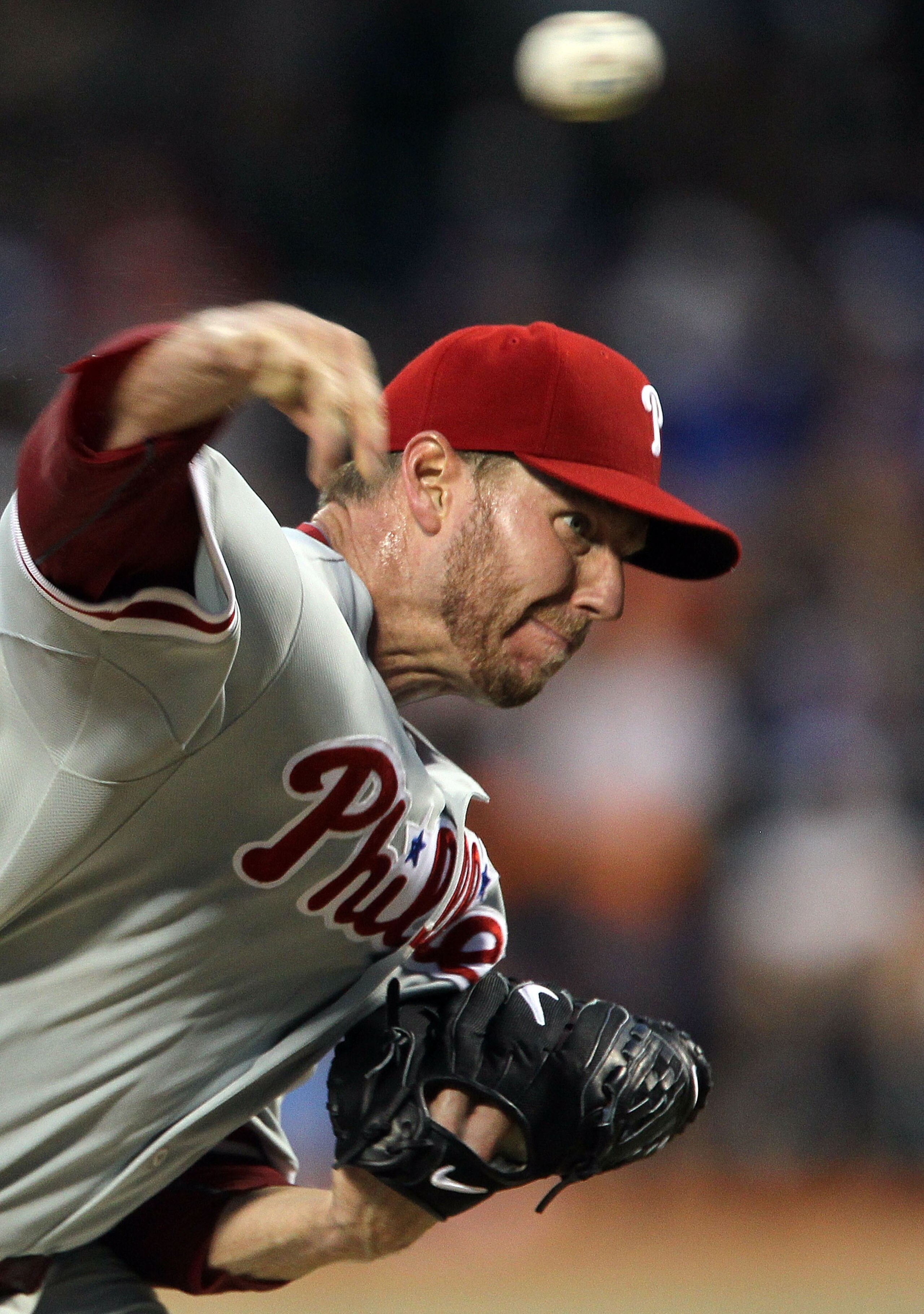 NEW YORK - AUGUST 14:  Roy Halladay #34 of the Philadelphia Phillies delivers a pitch against the New York Mets on August 14, 2010 at Citi Field in the Flushing neighborhood of the Queens borough of New York City.  (Photo by Jim McIsaac/Getty Images)