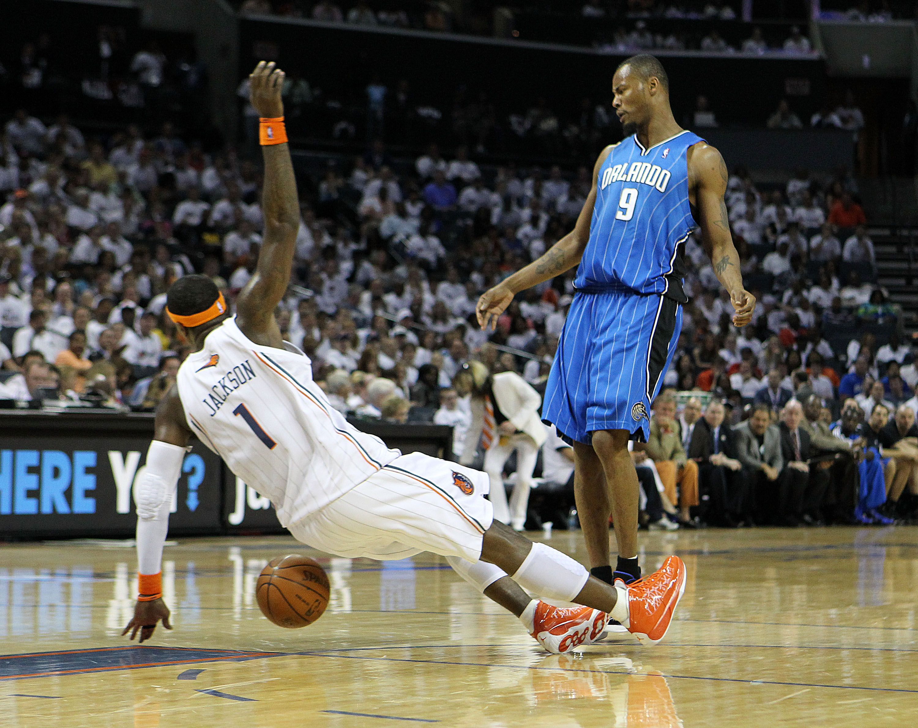 CHARLOTTE - APRIL 24:  Guard Stephen Jackson #1 of the Charlotte Bobcats draws an offensive foul on forward Rashard Lewis #9 of the Orlando Magic during Game Three of the Eastern Conference Quarterfinals during the 2010 NBA Playoffs at Time Warner Cable A