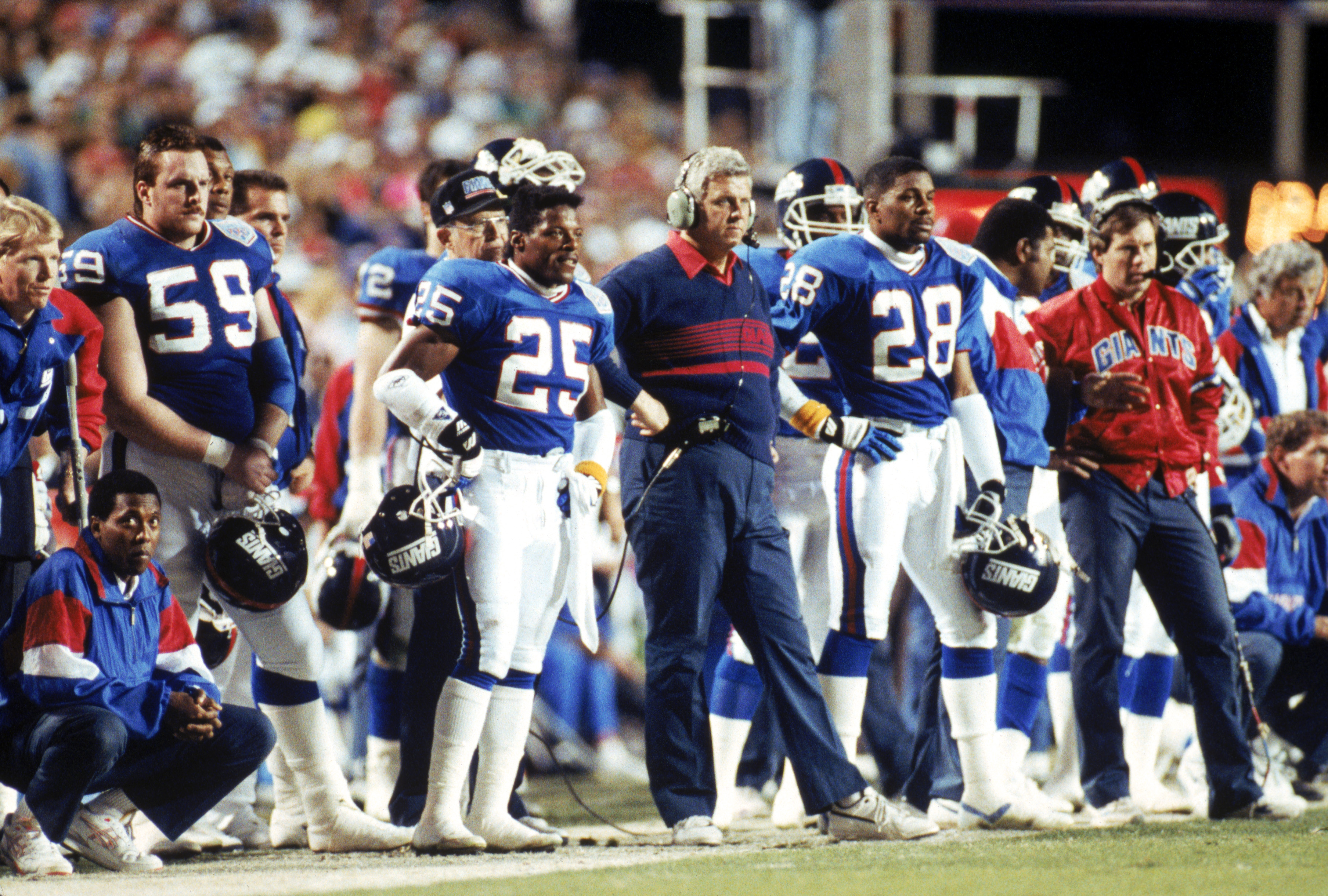 TAMPA, FL - JANUARY 27:  Cornerback Mark Collins #25, head coach Bill Parcells, cornerback Everson Walls #28 and assistant coach Bill Belichick of the New York Giants stand on the sideline against the Buffalo Bills during Super Bowl XXV at Tampa Stadium o