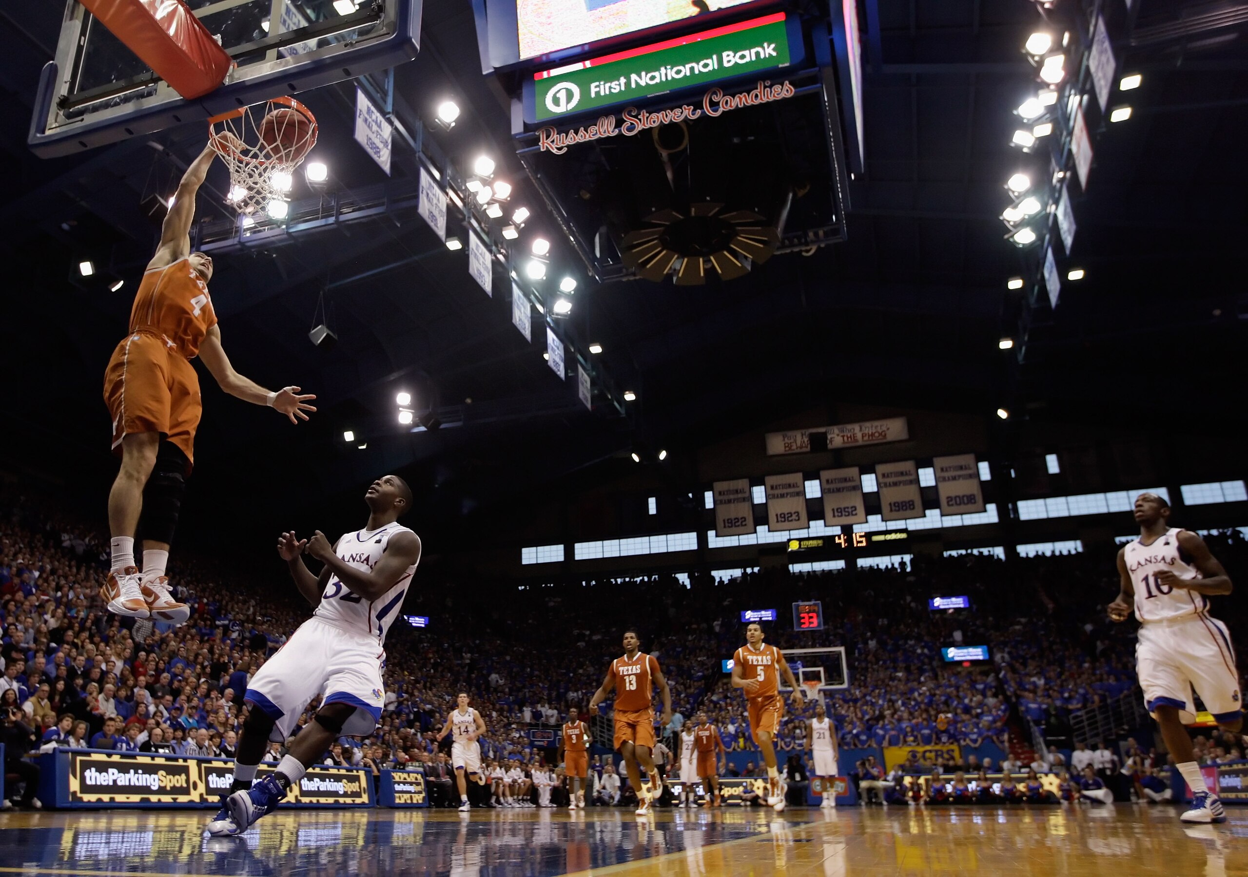 LAWRENCE, KS - JANUARY 22:  Dogus Balbay #4 of the Texas Longhorns scores on a fast break during the game against the Kansas Jayhawks on January 22, 2011 at Allen Fieldhouse in Lawrence, Kansas.  (Photo by Jamie Squire/Getty Images)