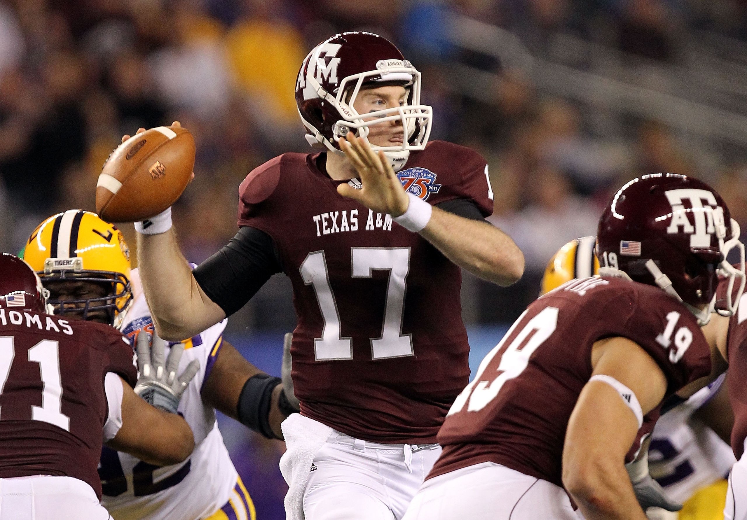 ARLINGTON, TX - JANUARY 07:  Quarterback Ryan Tannehill #17 of the Texas A&M Aggies throws against the LSU Tigers during the AT&T Cotton Bowl at Cowboys Stadium on January 7, 2011 in Arlington, Texas.  (Photo by Ronald Martinez/Getty Images)