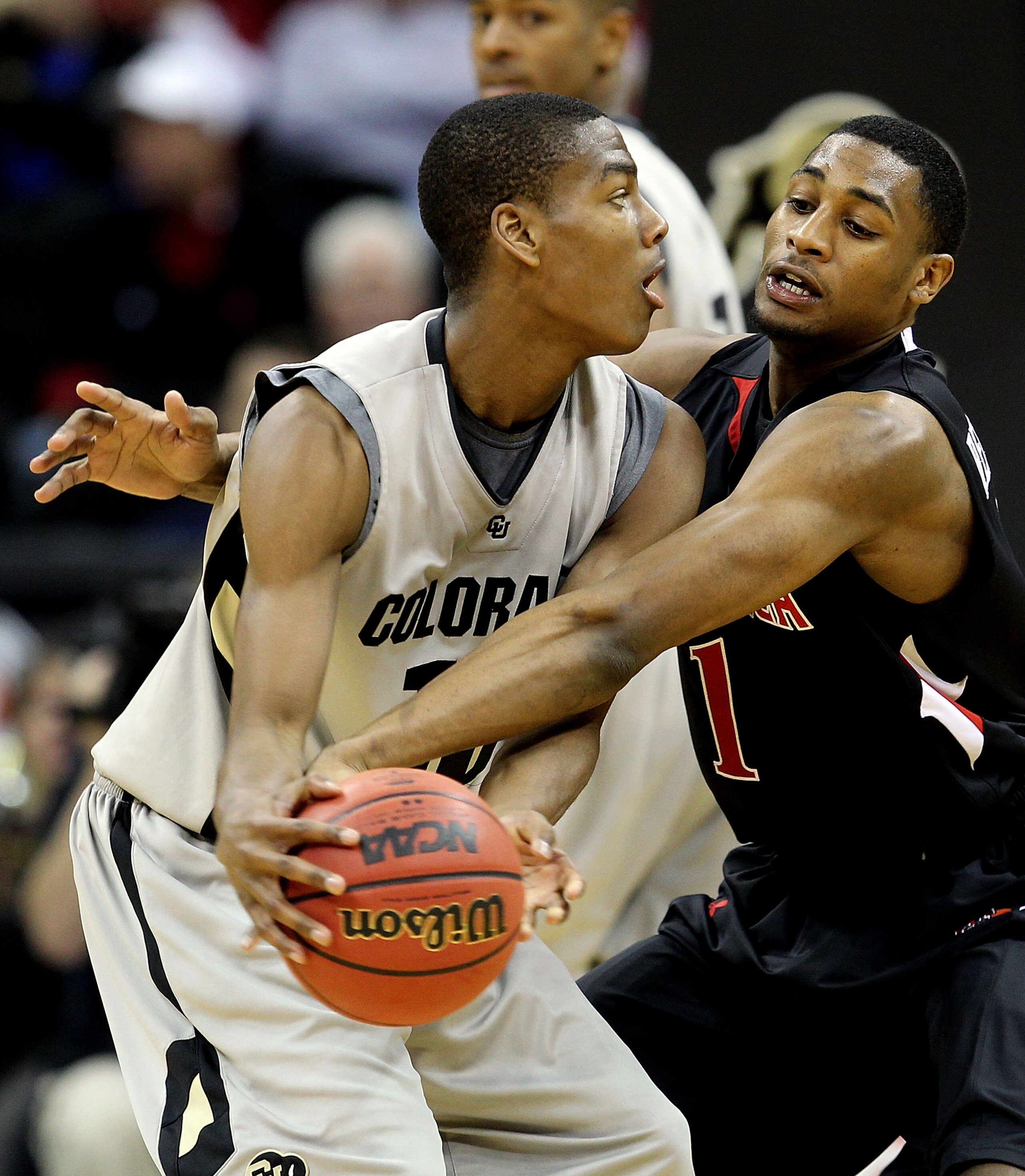 KANSAS CITY, MO - MARCH 10:  Alec Burks #10 of the Colorado Buffaloes is gaurded by Brad Reese #1 of the Texas Tech Red Raiders in the second half during the first round game of the 2010 Phillips 66 Big 12 Men's Basketball Tournament at the Sprint Center