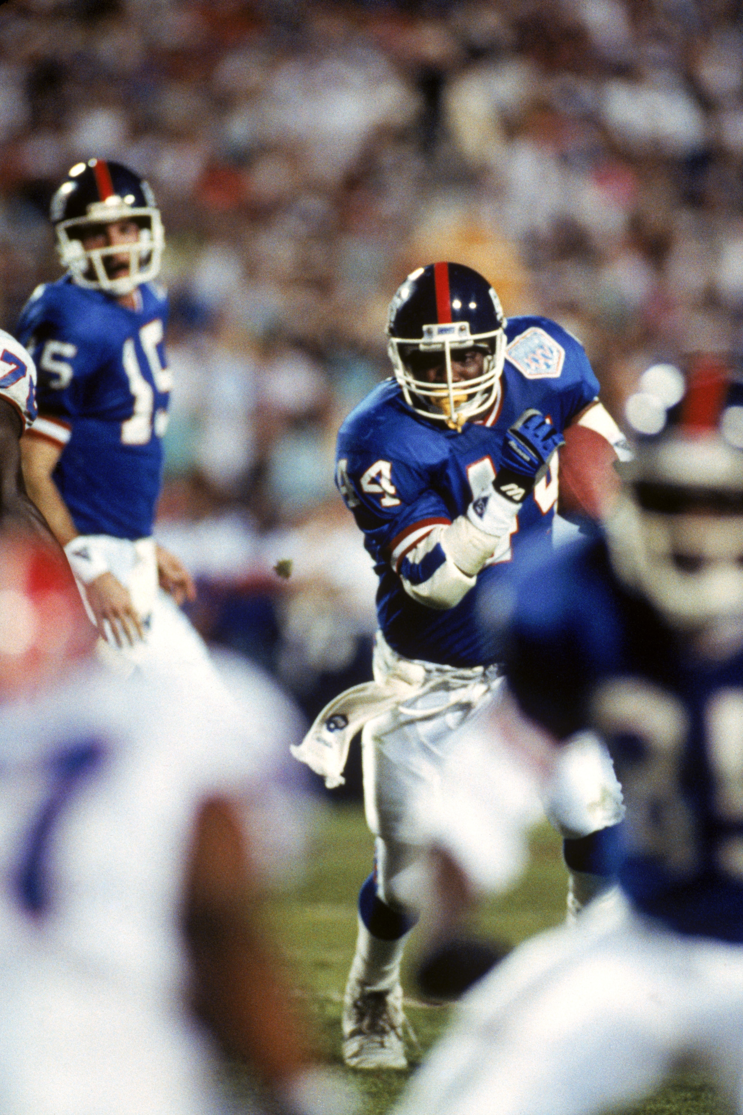 TAMPA, FL - JANUARY 27:  Running back Maurice Carthon #44 of the New York Giants carries the ball against the Buffalo Bills during Super Bowl XXV at Tampa Stadium on January 27, 1991 in Tampa, Florida. The Giants defeated the Bills 20-19.  (Photo by Georg