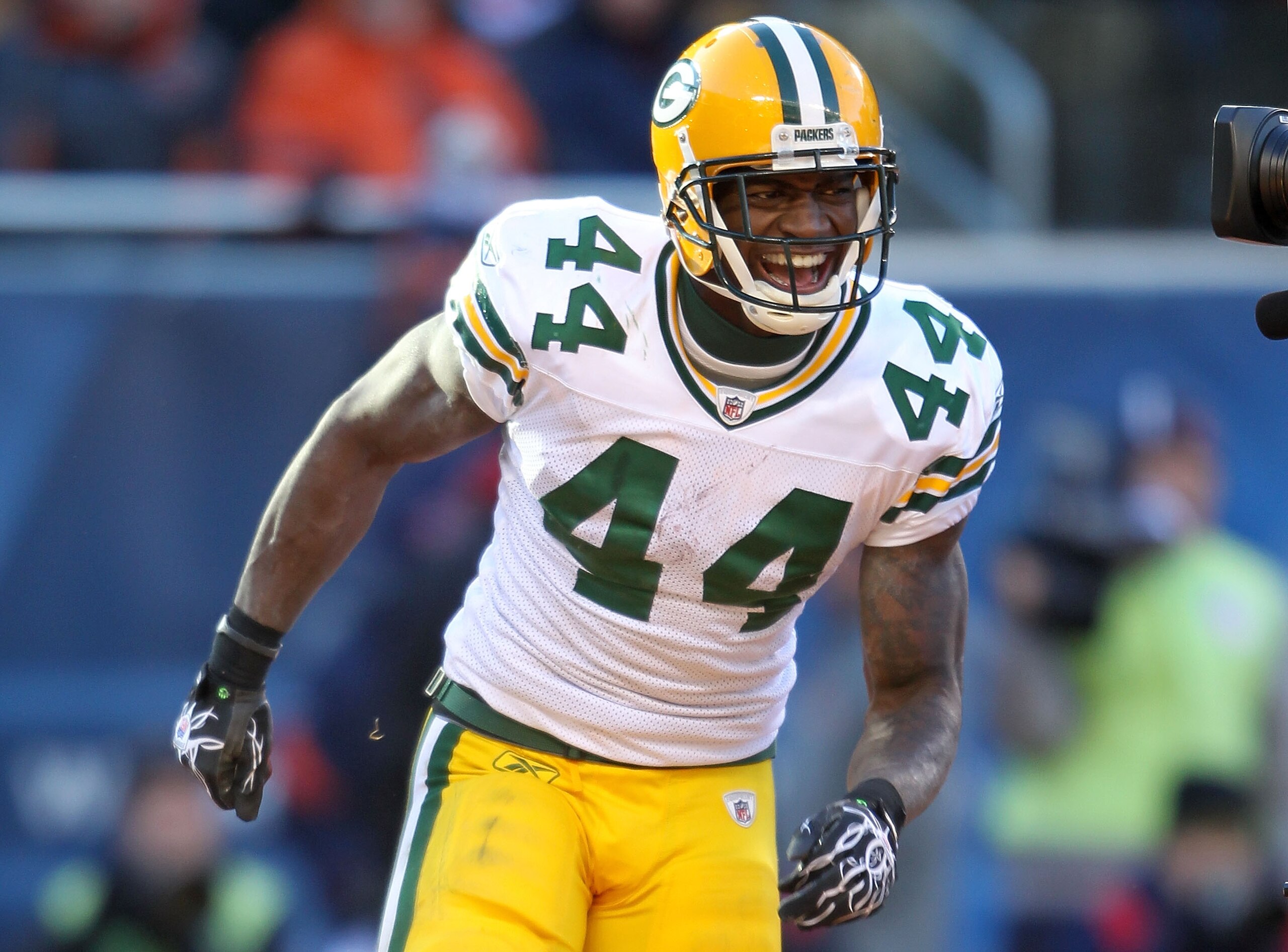 CHICAGO, IL - JANUARY 23:  Running back James Starks #44 of the Green Bay Packers reacts after his four-yard second quarter touchdown run against the Chicago Bears in the NFC Championship Game at Soldier Field on January 23, 2011 in Chicago, Illinois.  (P
