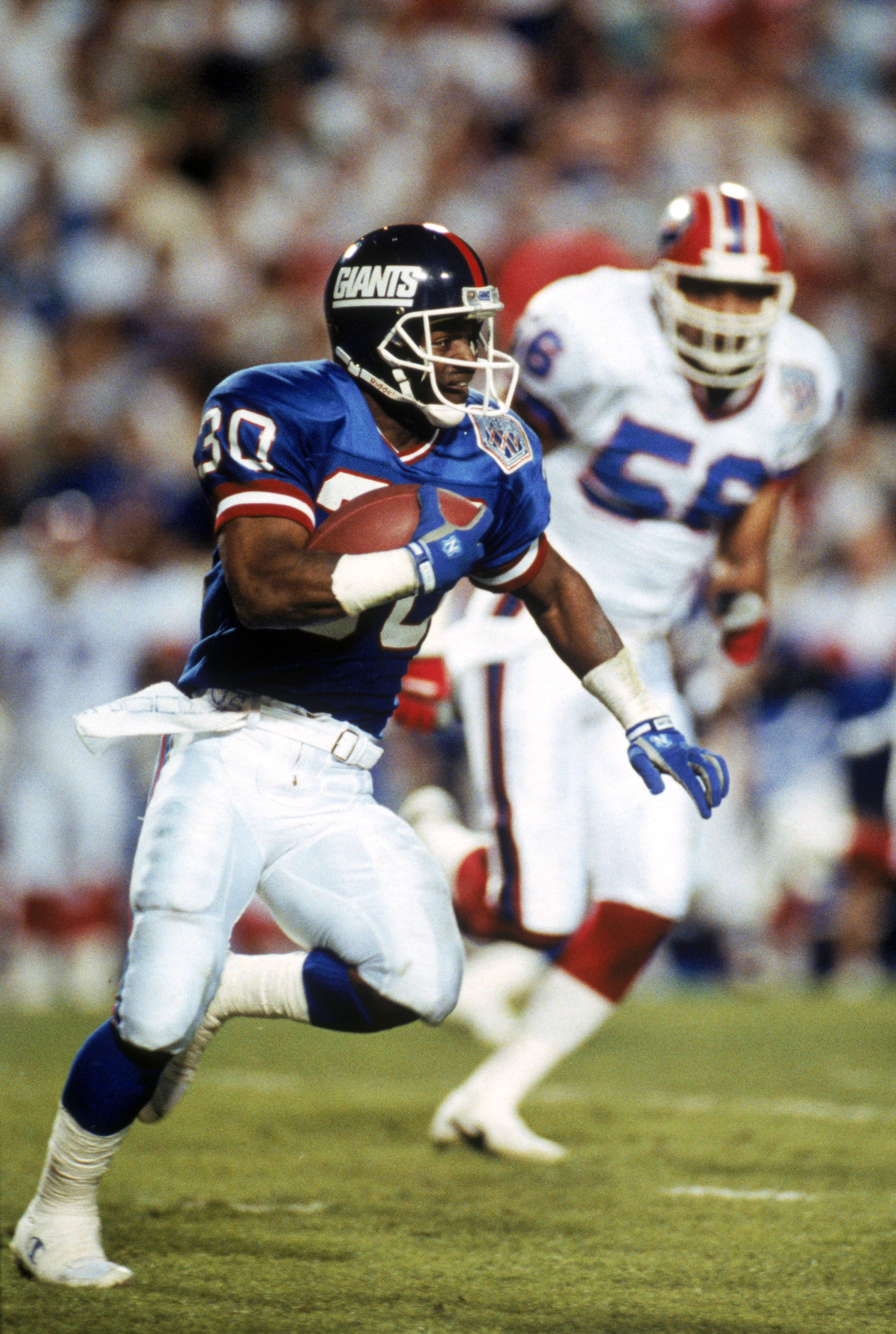 TAMPA, FL - JANUARY 27:  Kick returner Dave Meggett #30 of the New York Giants carries the ball against the Buffalo Bills during Super Bowl XXV at Tampa Stadium on January 27, 1991 in Tampa, Florida. The Giants defeated the Bills 20-19.  (Photo by George