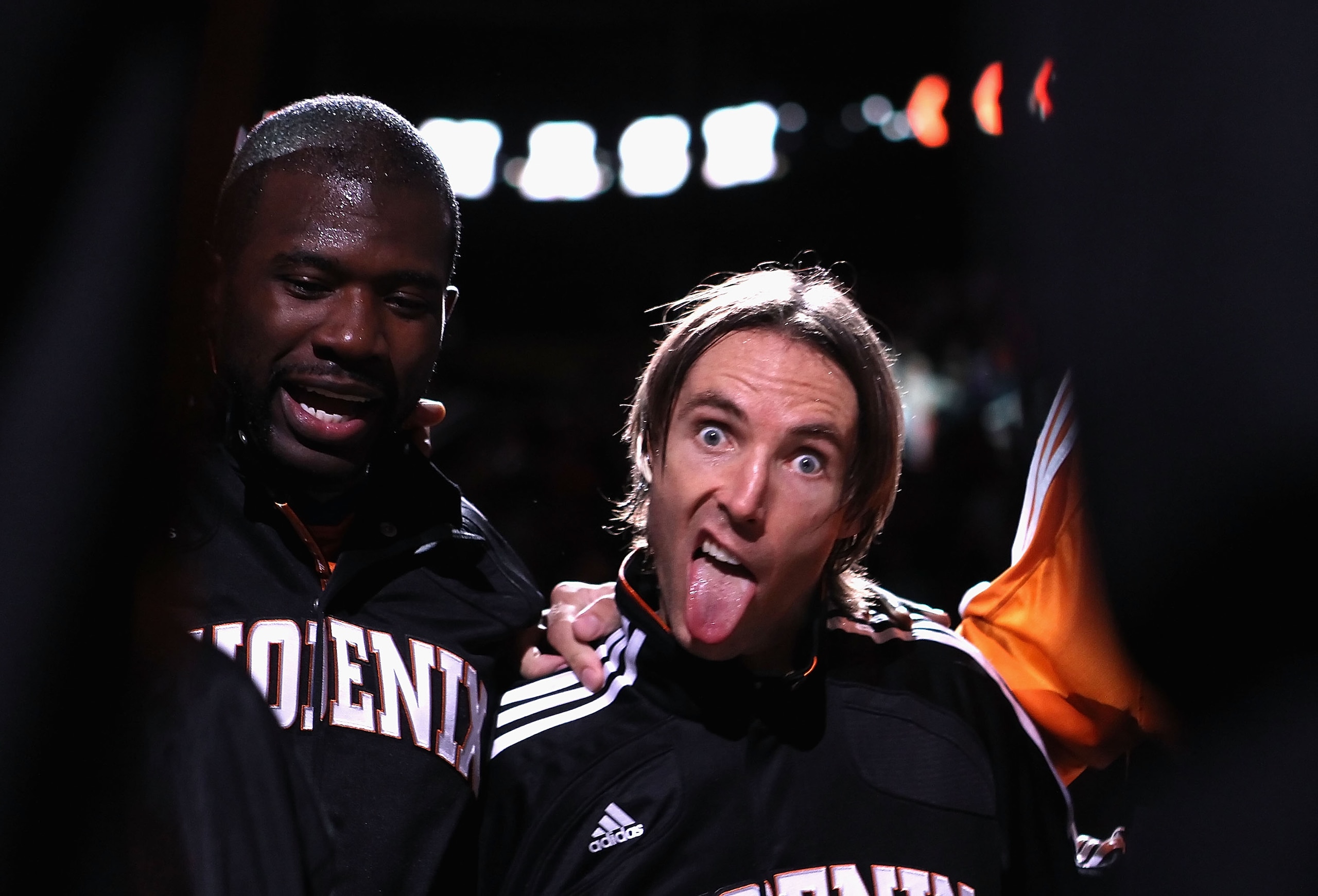 PHOENIX - OCTOBER 22: Steve Nash #13 of the Phoenix Suns makes a funny face while huddled up with teammates before the preseason NBA game against the Denver Nuggets at US Airways Center on October 22, 2010 in Phoenix, Arizona. NOTE TO USER: User expressl PHOENIX - OCTOBER 22: Steve Nash #13 of the Phoenix Suns makes a funny face while huddled up with teammates before the preseason NBA game against the Denver Nuggets at US Airways Center on October 22, 2010 in Phoenix, Arizona. NOTE TO USER: User expressl