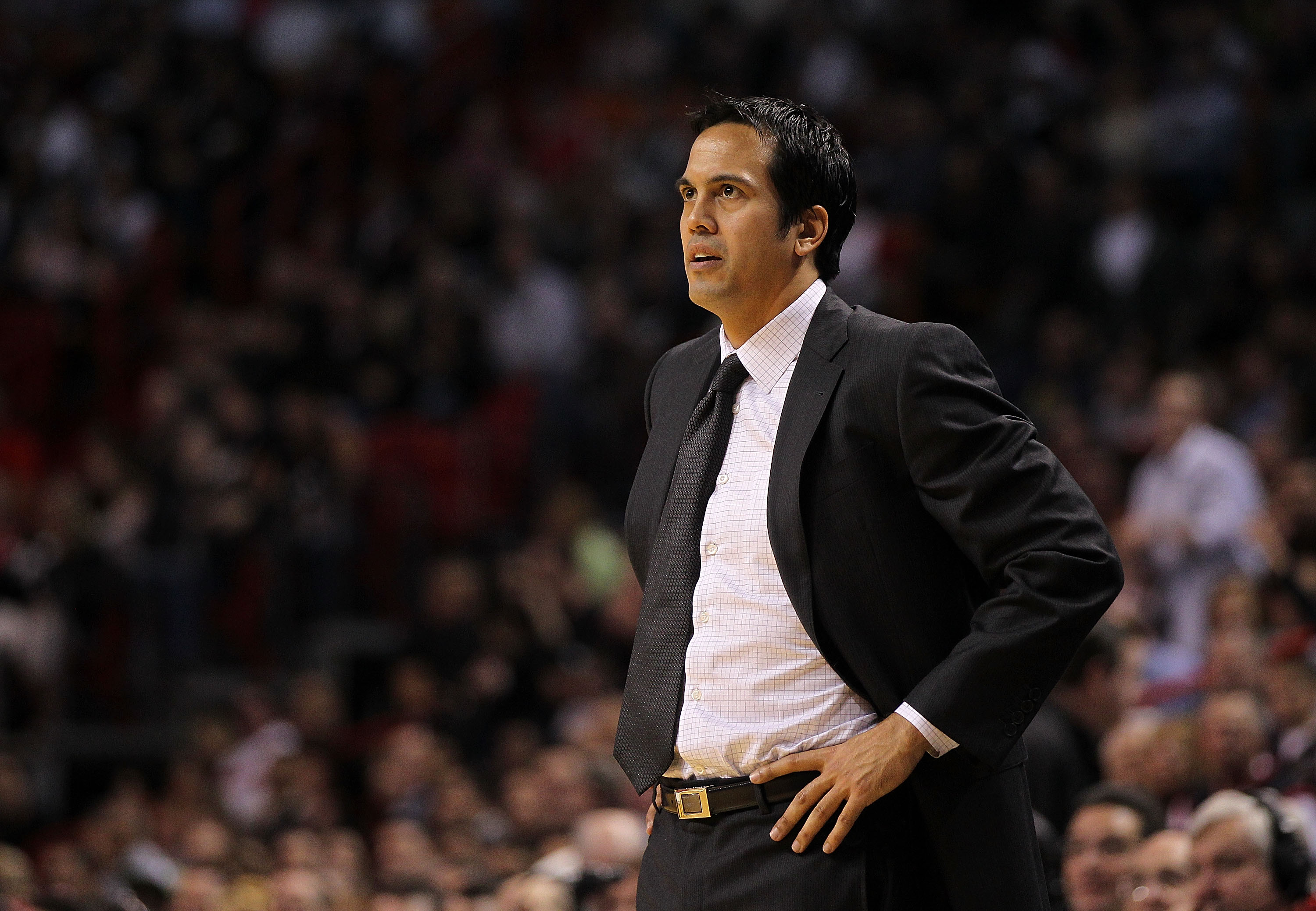 MIAMI, FL - JANUARY 22: Miami Heat head coach Erik Spoelstra looks on during a game against the Toronto Raptors at American Airlines Arena on January 22, 2011 in Miami, Florida. NOTE TO USER: User expressly acknowledges and agrees that, by downloading and