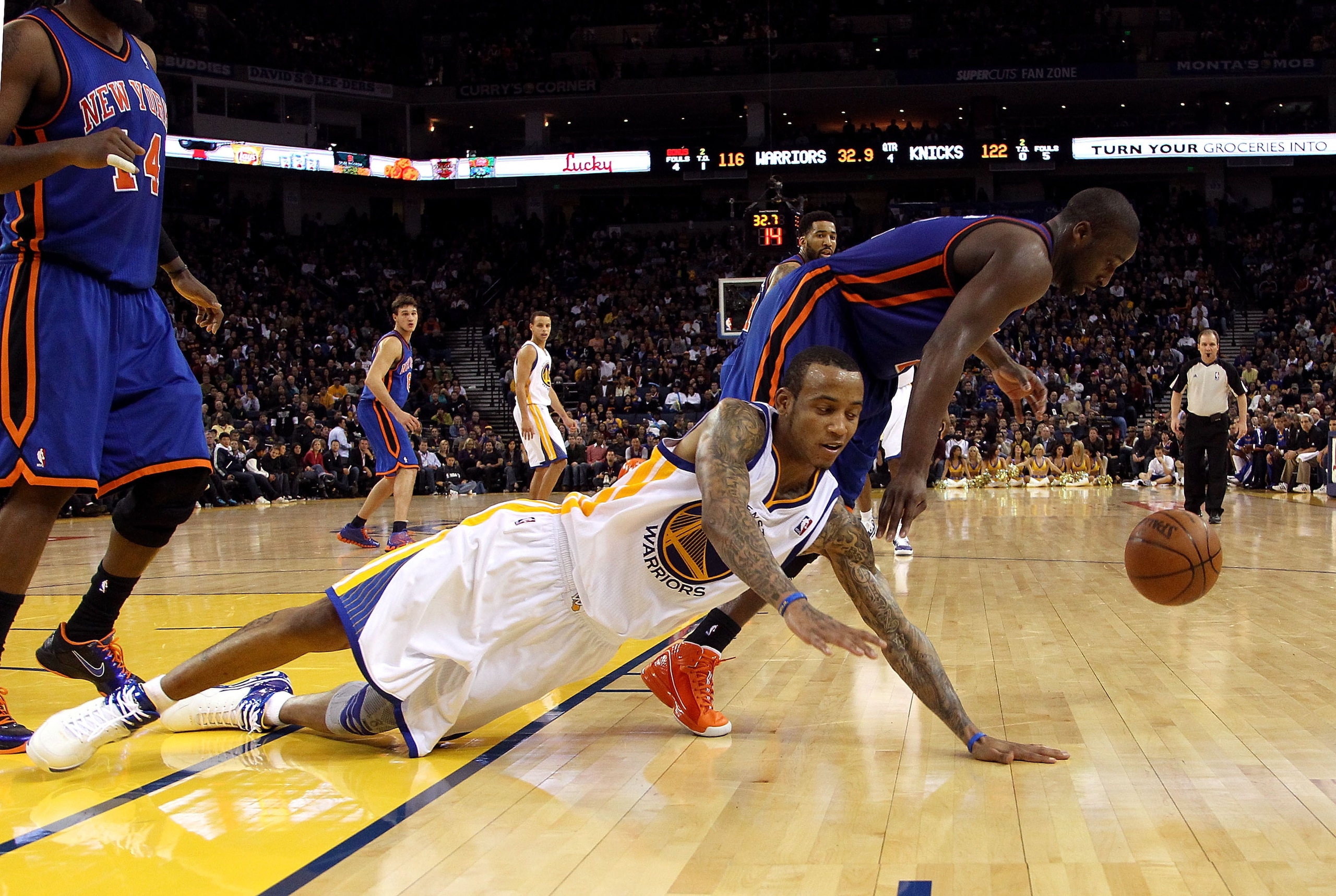 OAKLAND, CA - NOVEMBER 19:  Monta Ellis #8 of the Golden State Warriors tries to steal the ball from Raymond Felton #2 of the New York Knicks at Oracle Arena on November 19, 2010 in Oakland, California. NOTE TO USER: User expressly acknowledges and agrees
