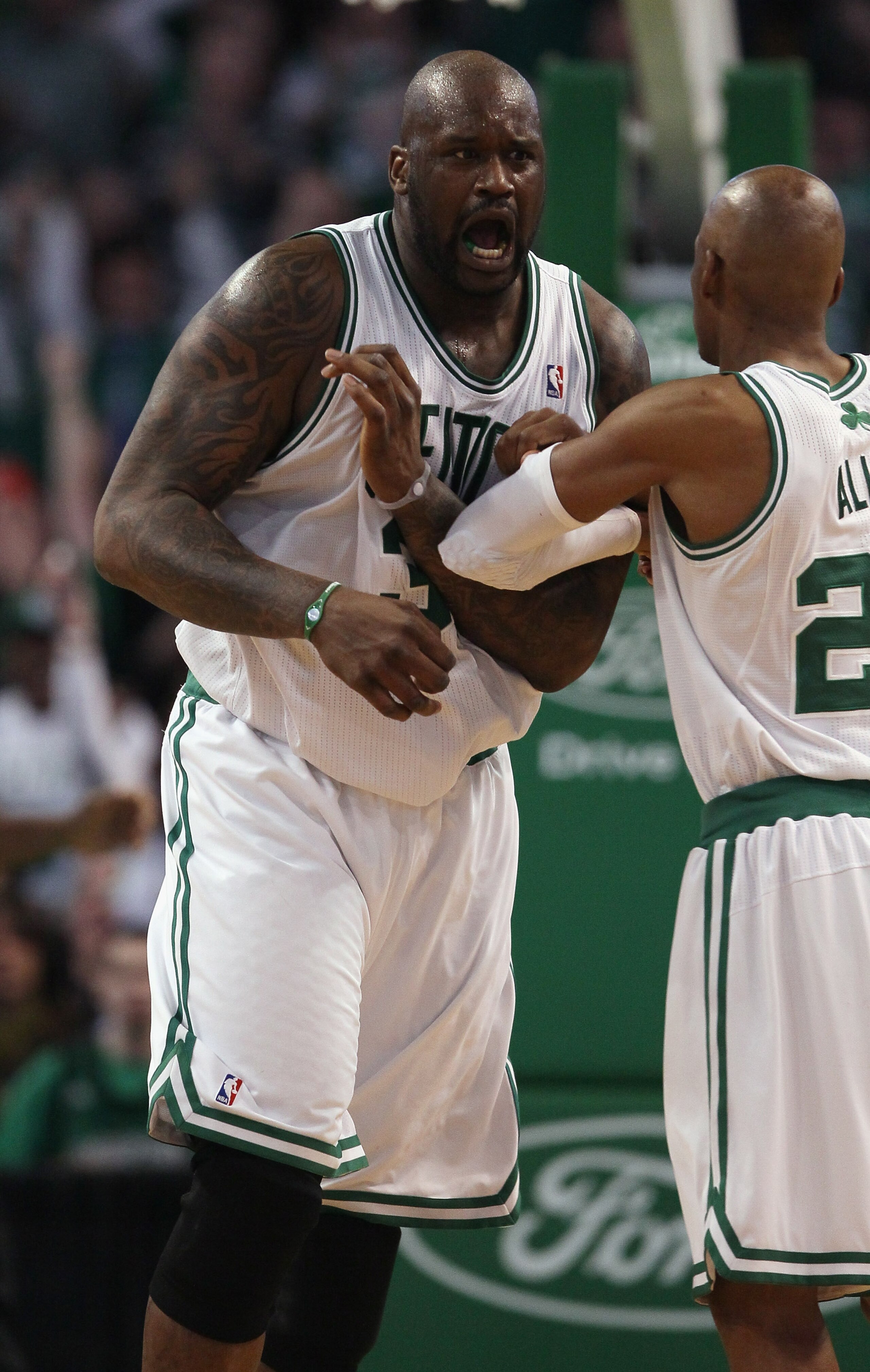 BOSTON, MA - JANUARY 19: Shaquille O'Neal #36 of the Boston Celtics celebrates with teammate Ray Allen #20 in the fourth quarter against the Detroit Pistons on January 19, 2011 at the TD Garden in Boston, Massachusetts. The Celtics defeated the Pistons 8 BOSTON, MA - JANUARY 19: Shaquille O'Neal #36 of the Boston Celtics celebrates with teammate Ray Allen #20 in the fourth quarter against the Detroit Pistons on January 19, 2011 at the TD Garden in Boston, Massachusetts. The Celtics defeated the Pistons 8